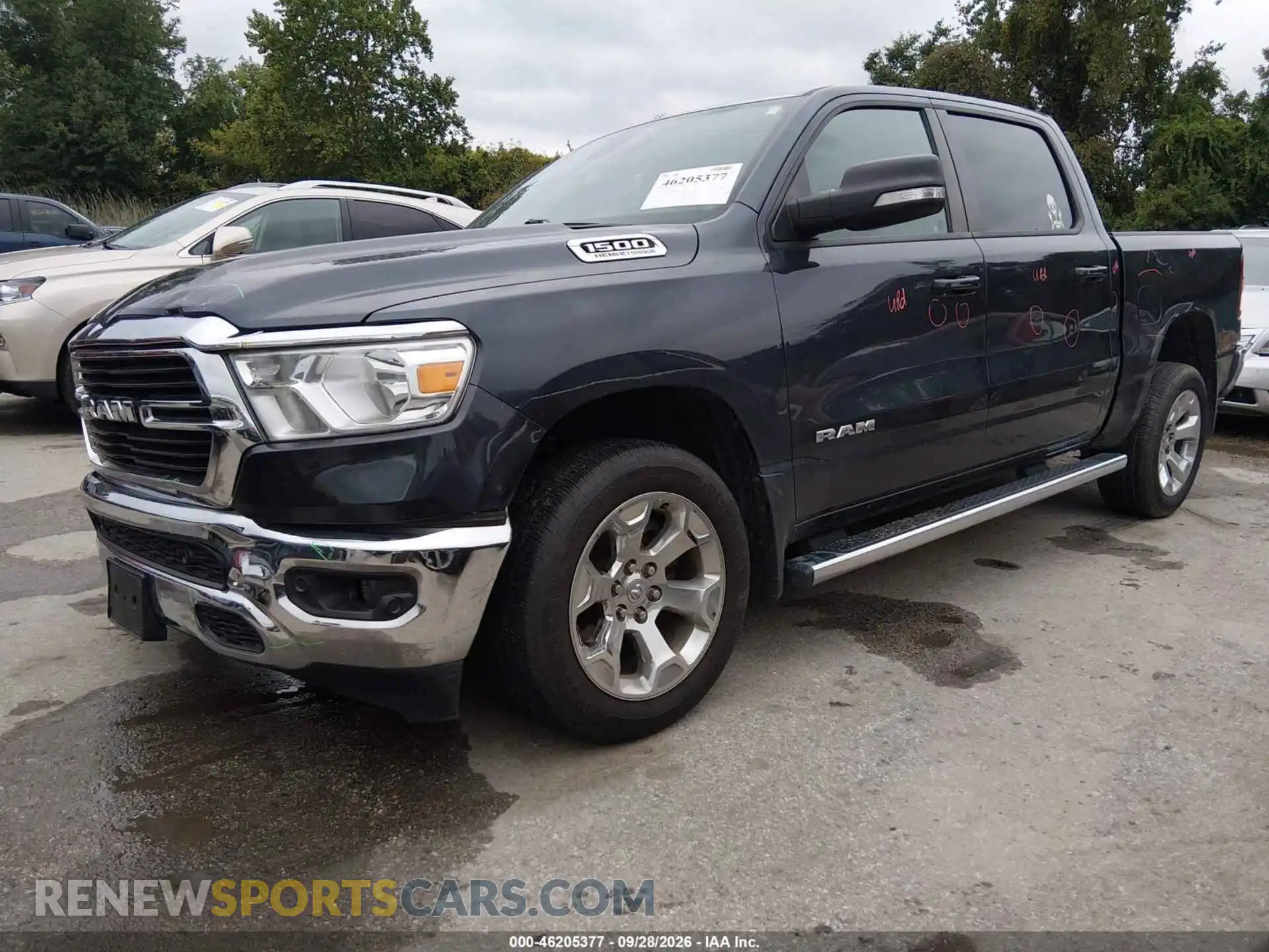 2 Photograph of a damaged car 1C6SRFFT1MN797166 RAM 1500 2021