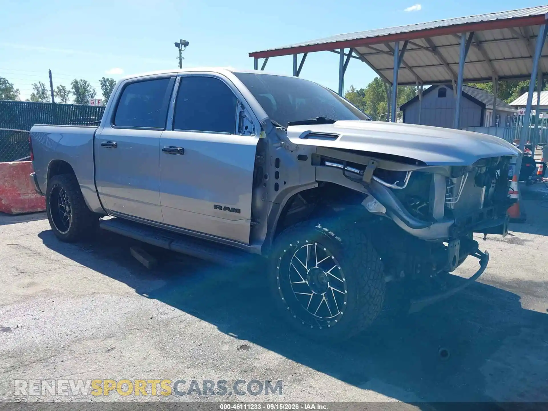 1 Photograph of a damaged car 1C6SRFFT2MN555731 RAM 1500 2021