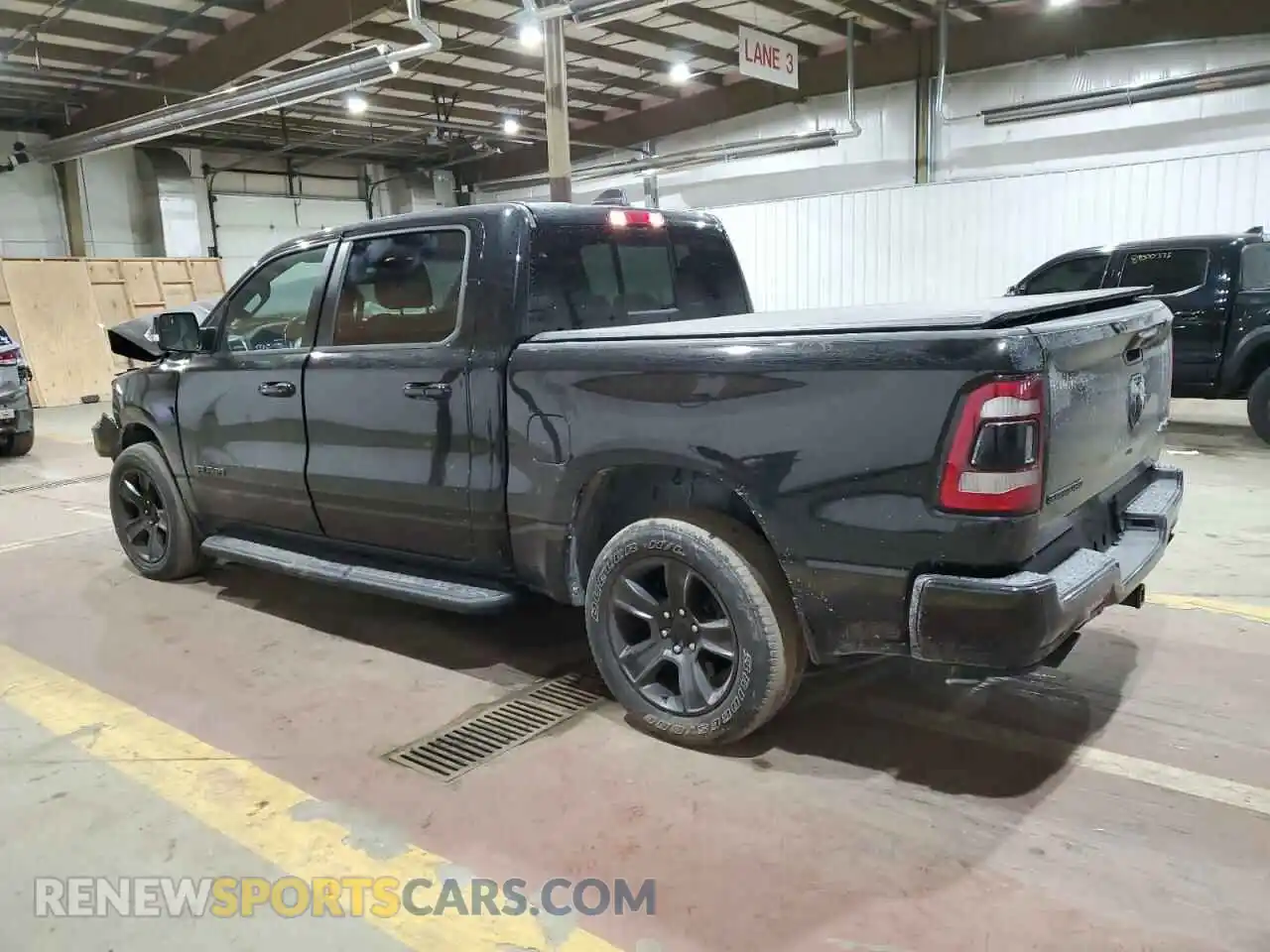 2 Photograph of a damaged car 1C6SRFFT2MN588213 RAM 1500 2021