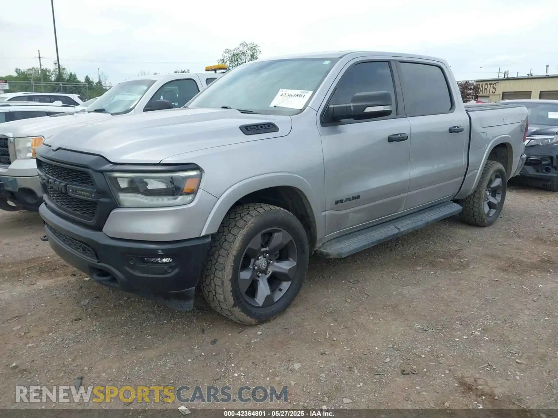 2 Photograph of a damaged car 1C6SRFFT2MN597123 RAM 1500 2021