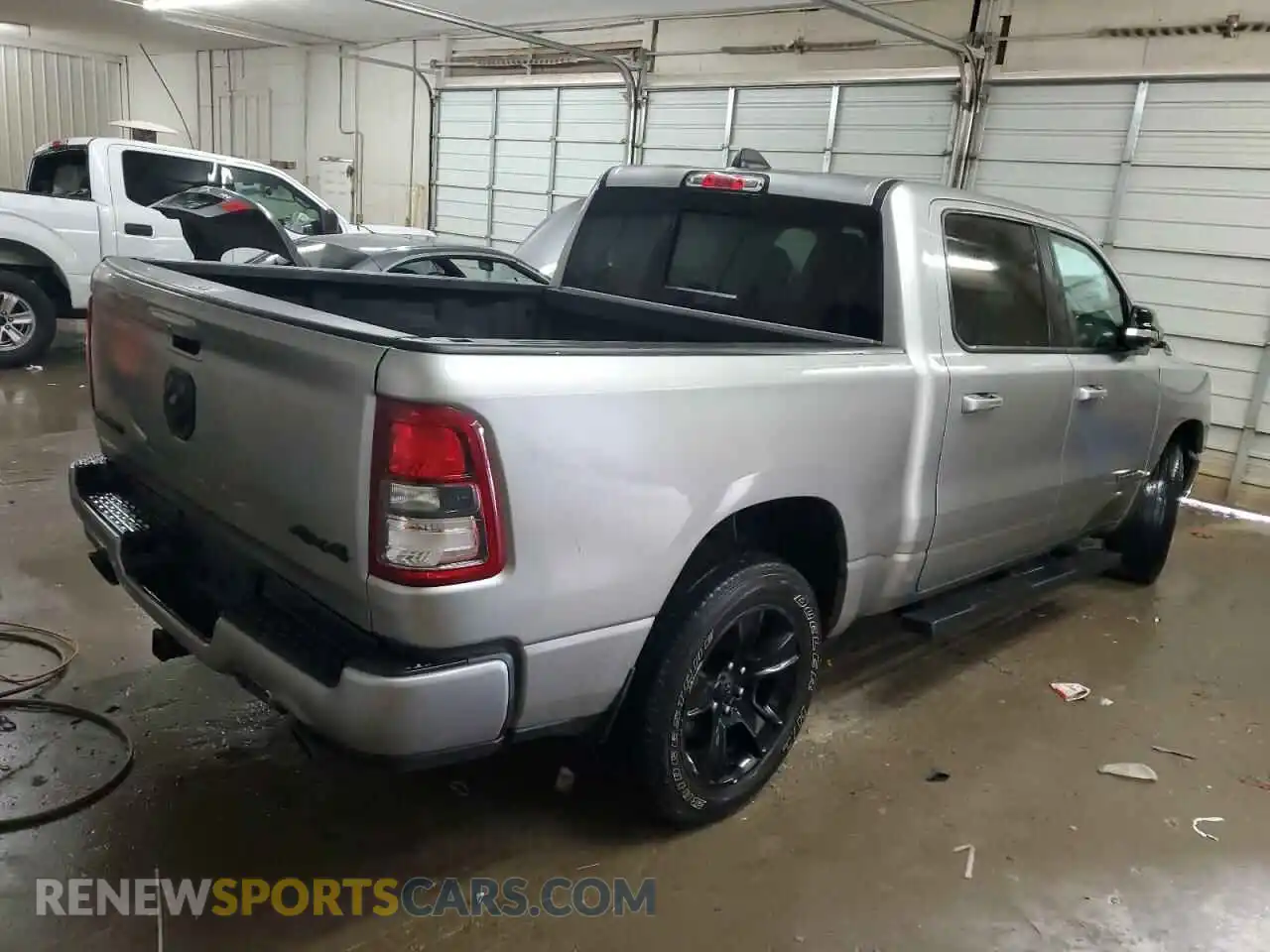 3 Photograph of a damaged car 1C6SRFFT2MN598580 RAM 1500 2021