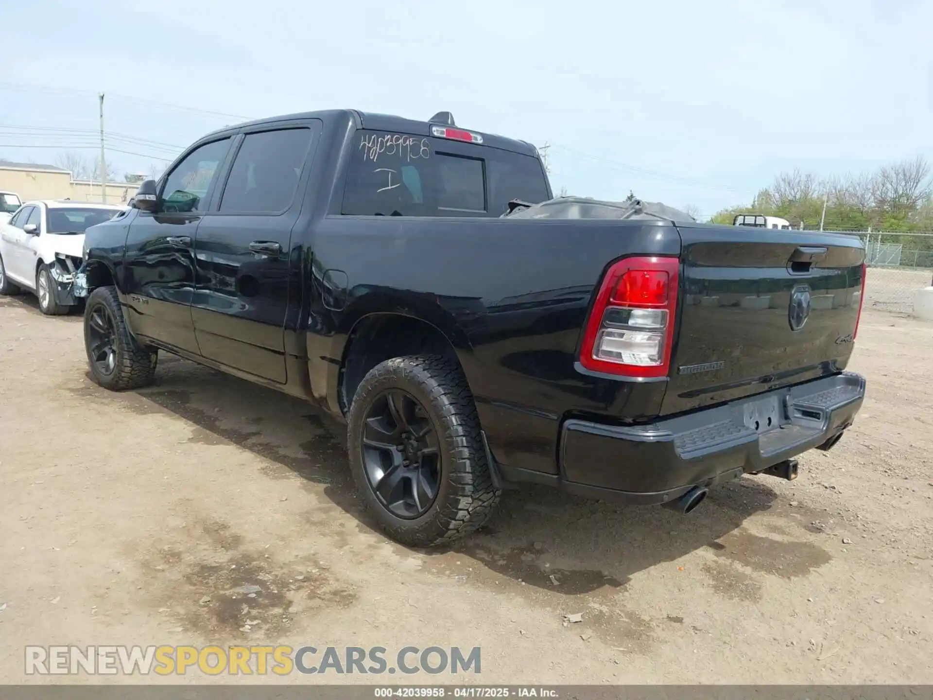 3 Photograph of a damaged car 1C6SRFFT2MN601851 RAM 1500 2021