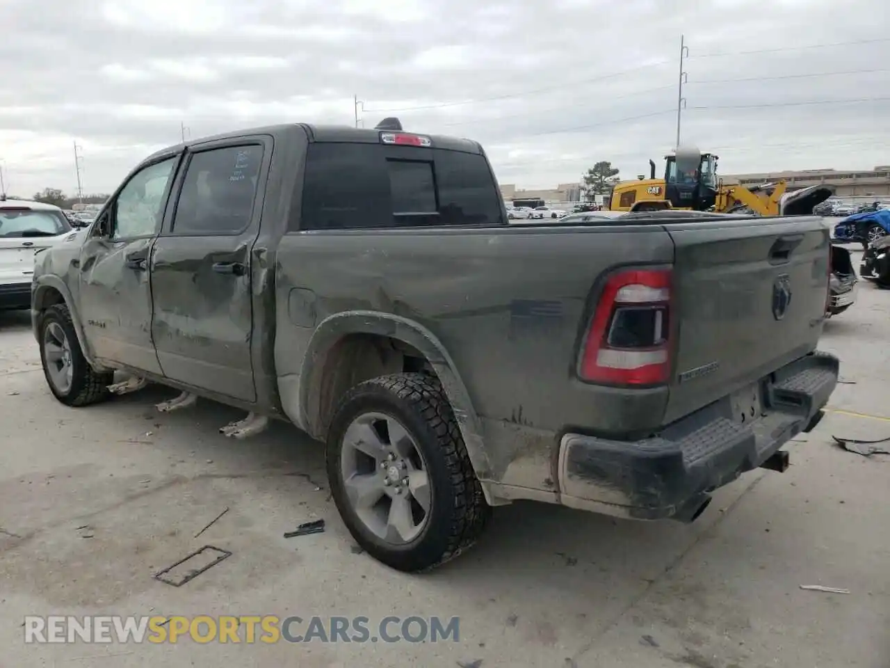 2 Photograph of a damaged car 1C6SRFFT2MN628290 RAM 1500 2021