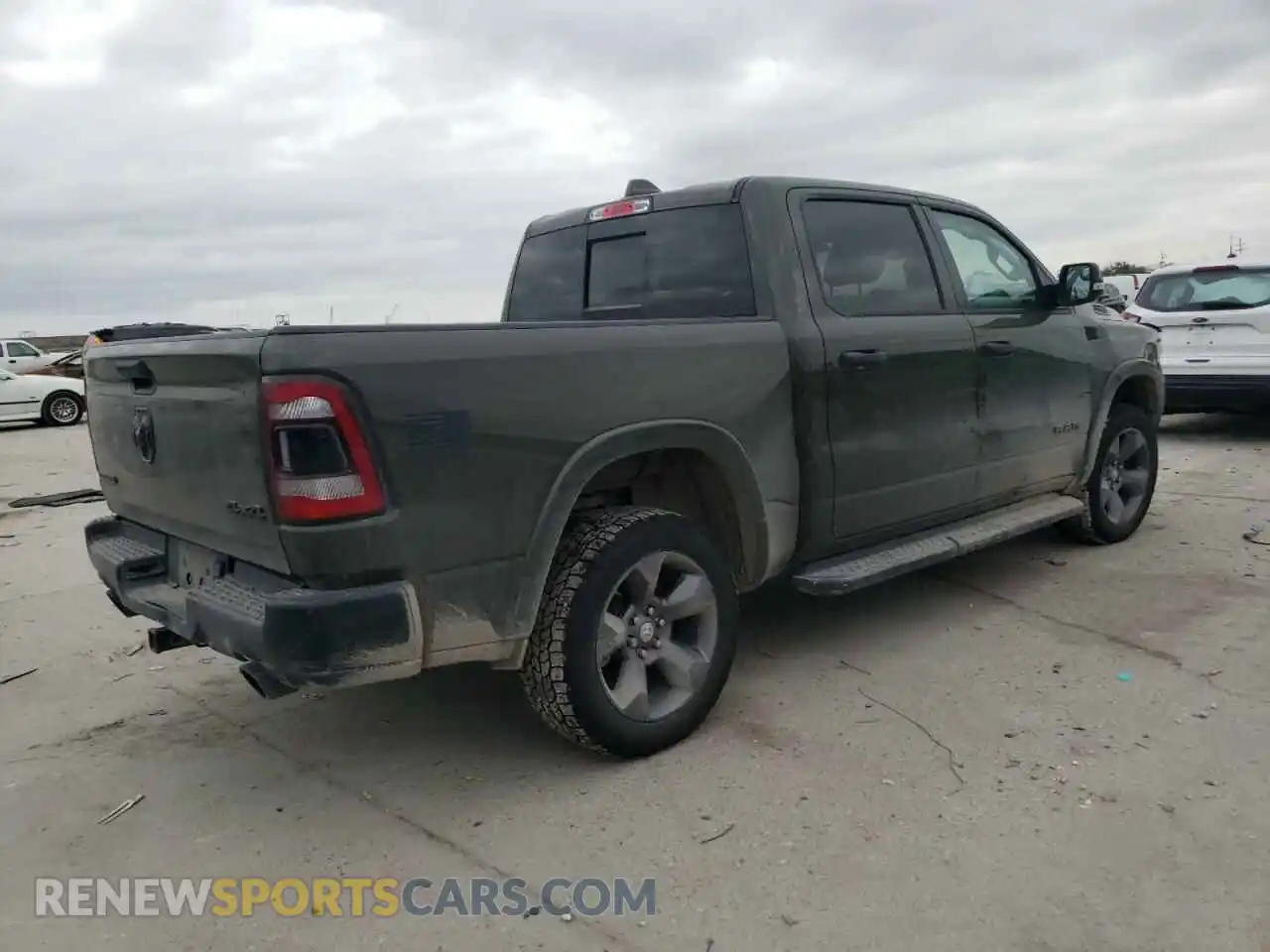 3 Photograph of a damaged car 1C6SRFFT2MN628290 RAM 1500 2021