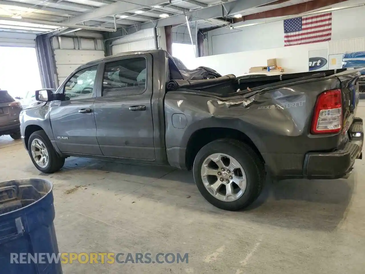 2 Photograph of a damaged car 1C6SRFFT2MN634011 RAM 1500 2021