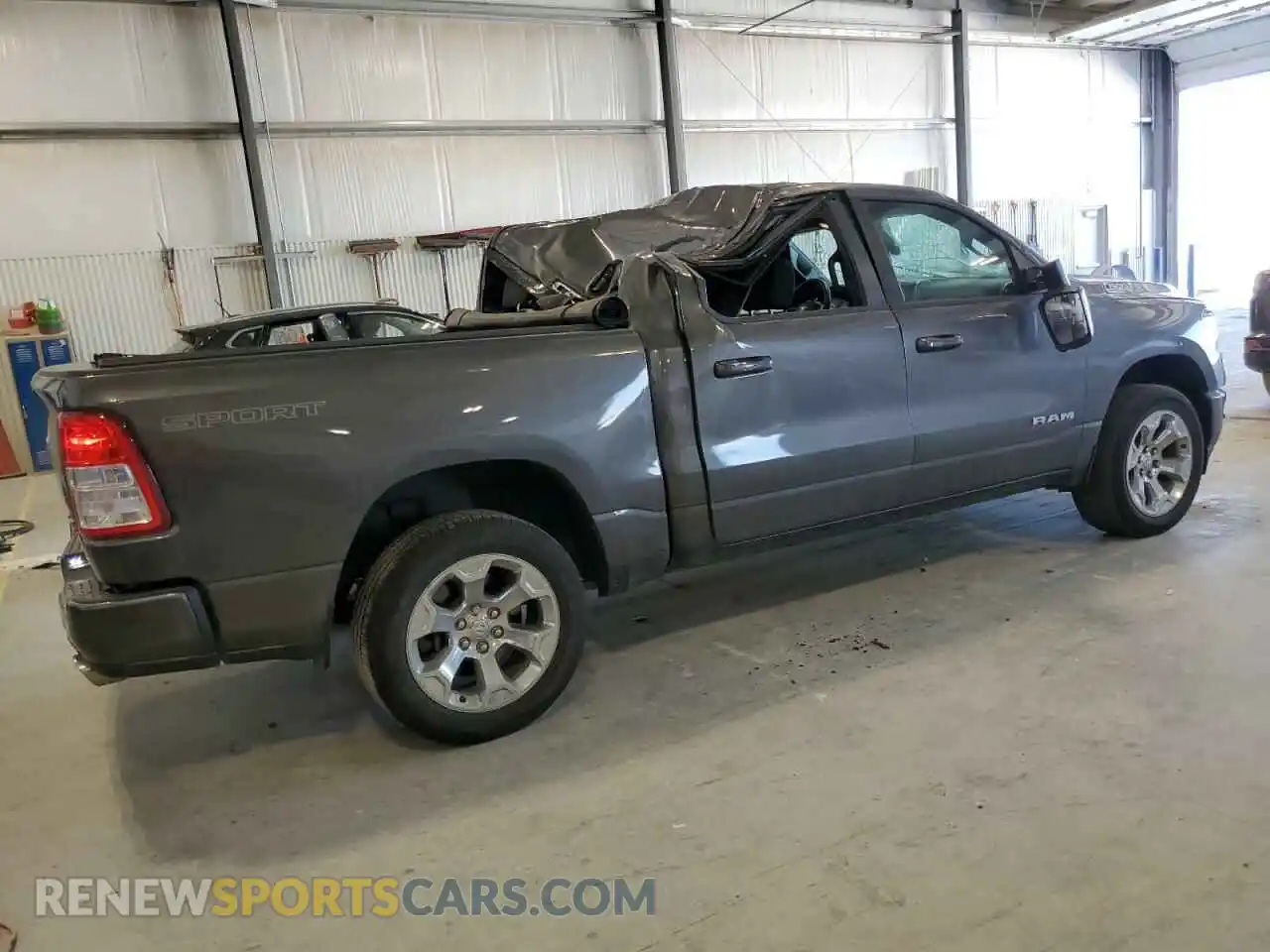 3 Photograph of a damaged car 1C6SRFFT2MN634011 RAM 1500 2021