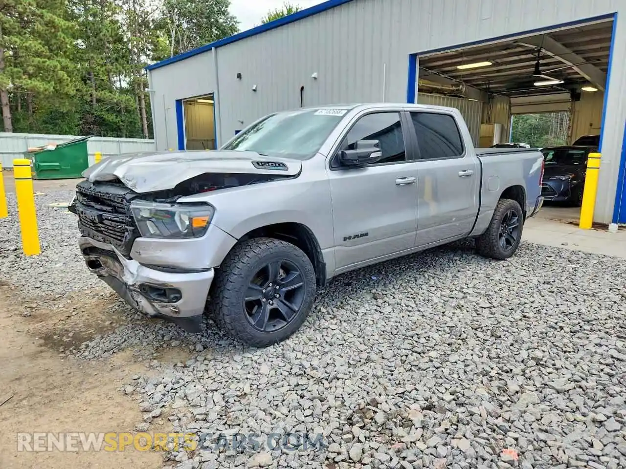 1 Photograph of a damaged car 1C6SRFFT2MN675142 RAM 1500 2021