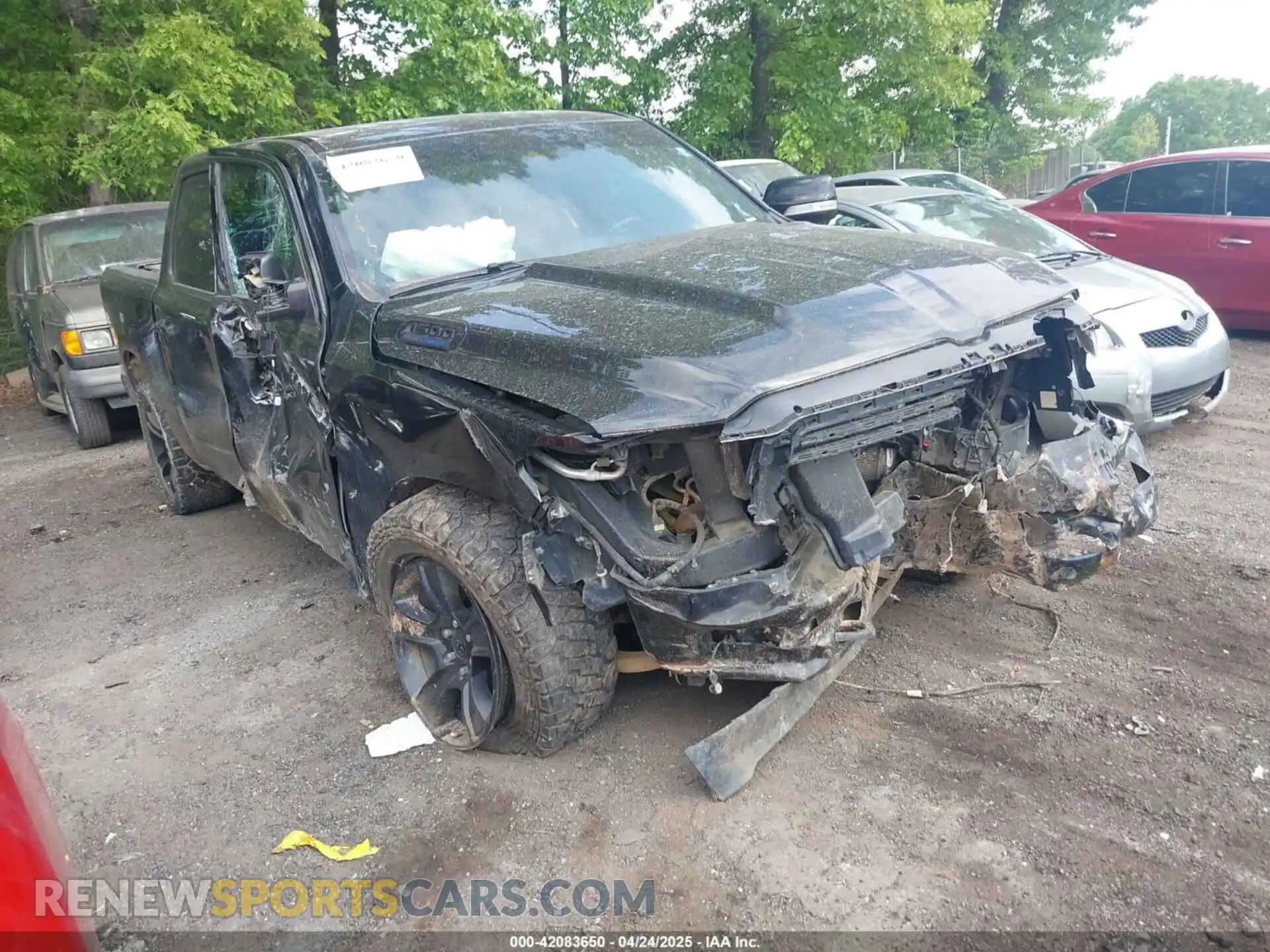1 Photograph of a damaged car 1C6SRFFT2MN678090 RAM 1500 2021