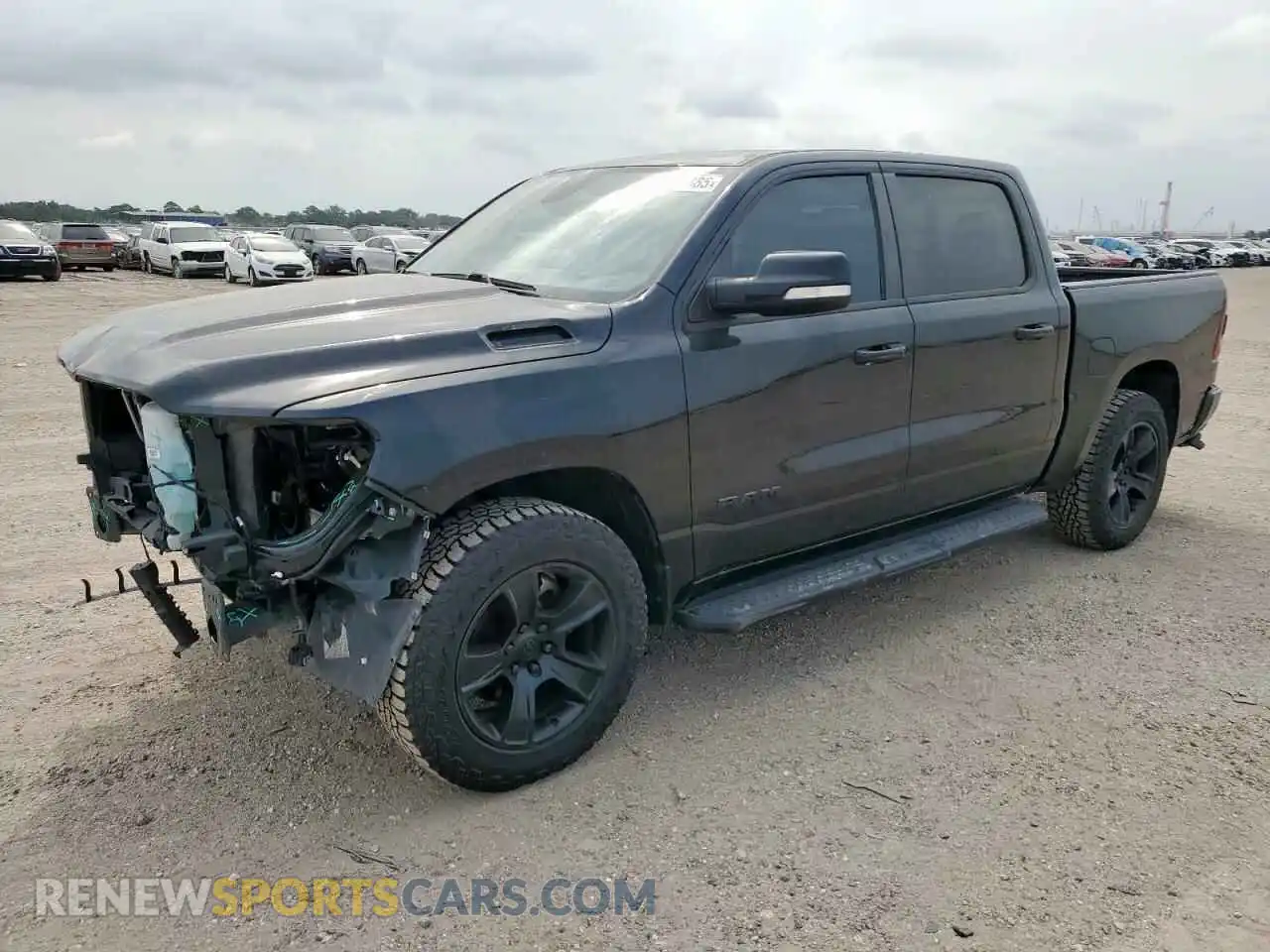 1 Photograph of a damaged car 1C6SRFFT2MN766640 RAM 1500 2021