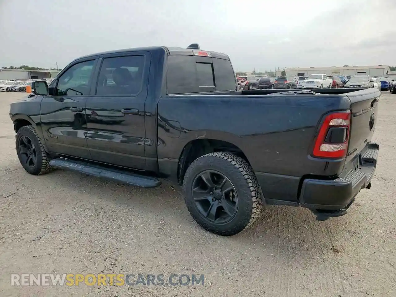 2 Photograph of a damaged car 1C6SRFFT2MN766640 RAM 1500 2021
