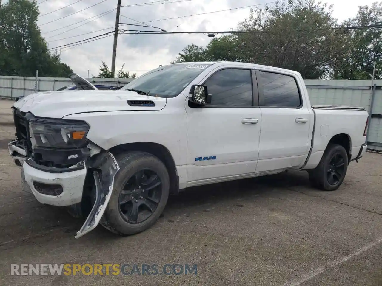 1 Photograph of a damaged car 1C6SRFFT3MN523094 RAM 1500 2021