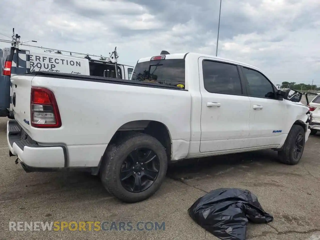 3 Photograph of a damaged car 1C6SRFFT3MN523094 RAM 1500 2021