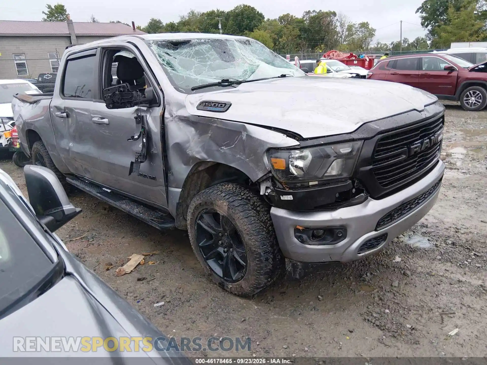 1 Photograph of a damaged car 1C6SRFFT3MN550070 RAM 1500 2021