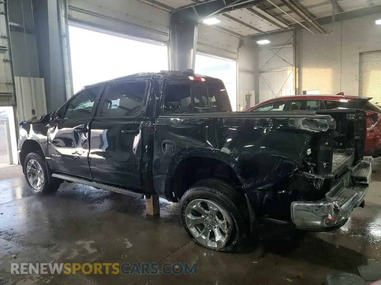2 Photograph of a damaged car 1C6SRFFT3MN553888 RAM 1500 2021