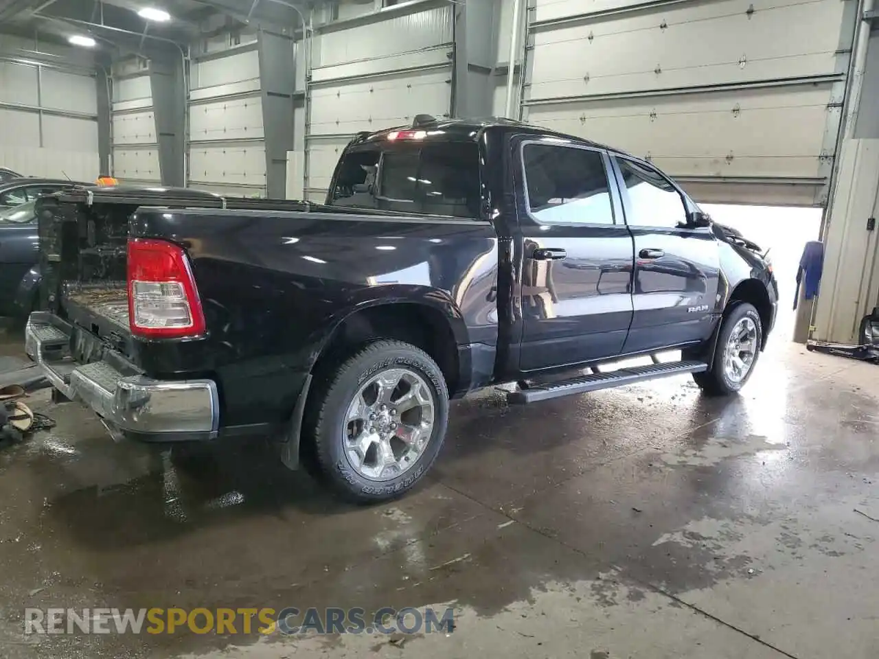 3 Photograph of a damaged car 1C6SRFFT3MN553888 RAM 1500 2021