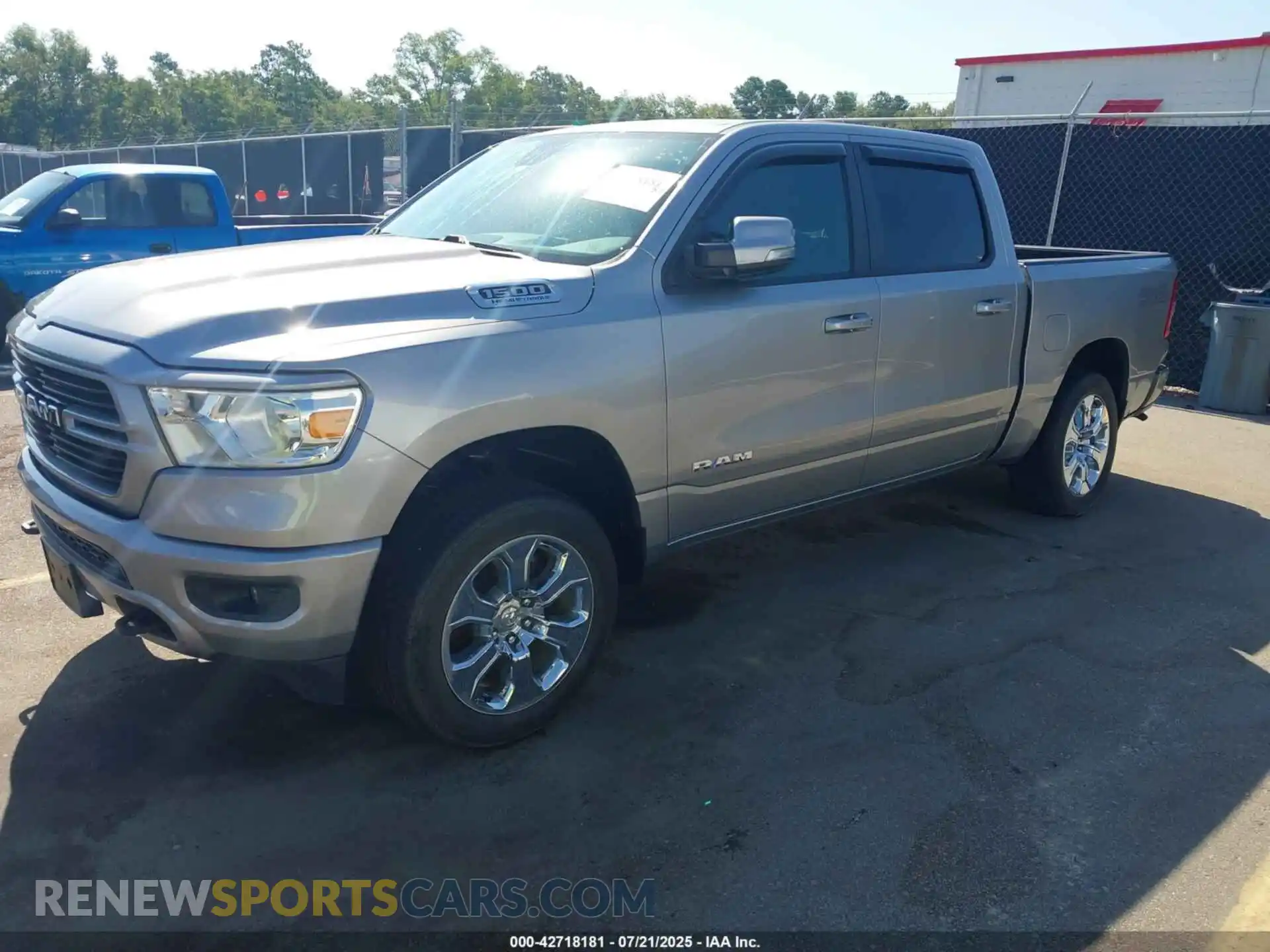 2 Photograph of a damaged car 1C6SRFFT3MN559240 RAM 1500 2021