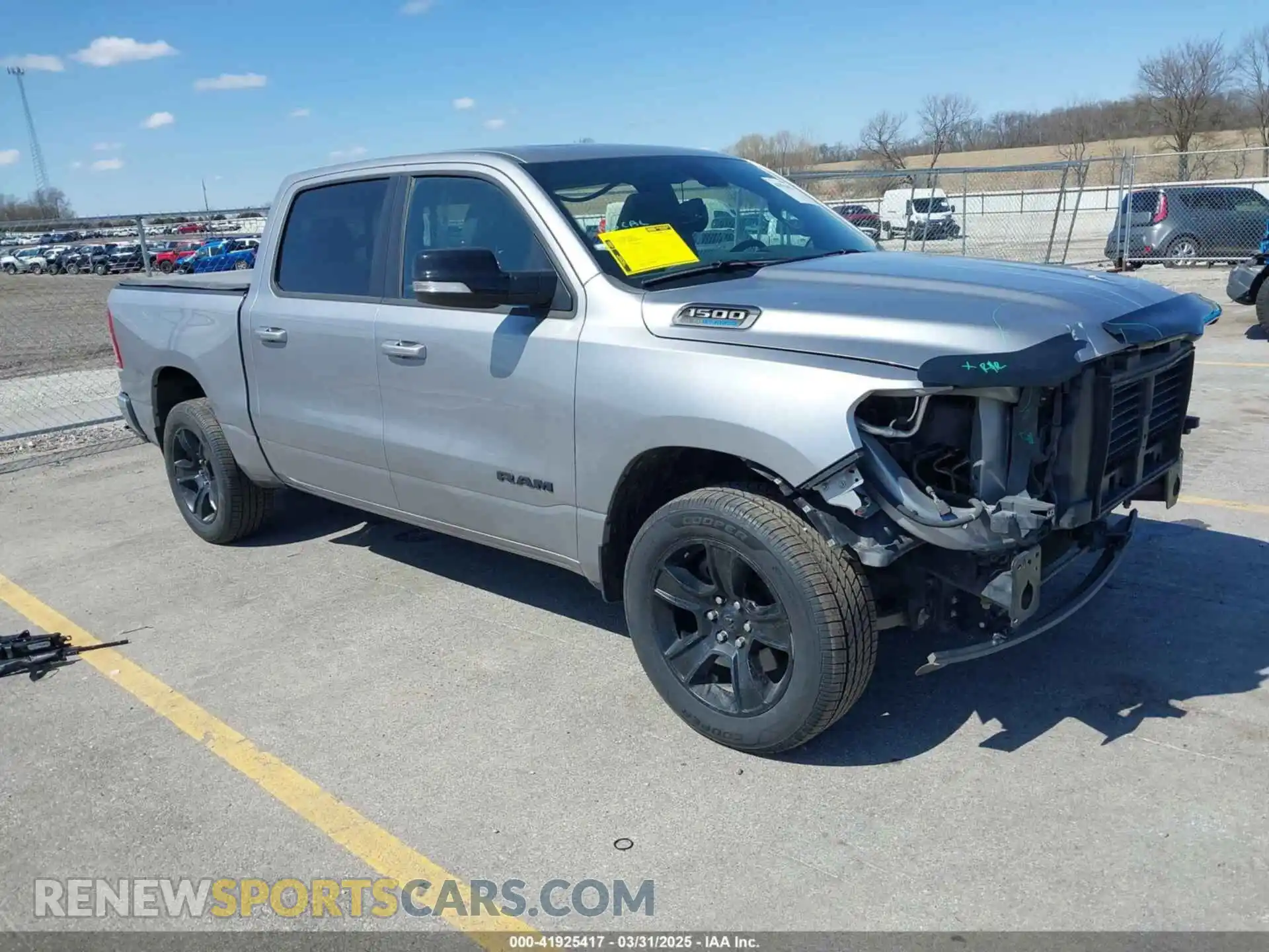 1 Photograph of a damaged car 1C6SRFFT3MN588205 RAM 1500 2021