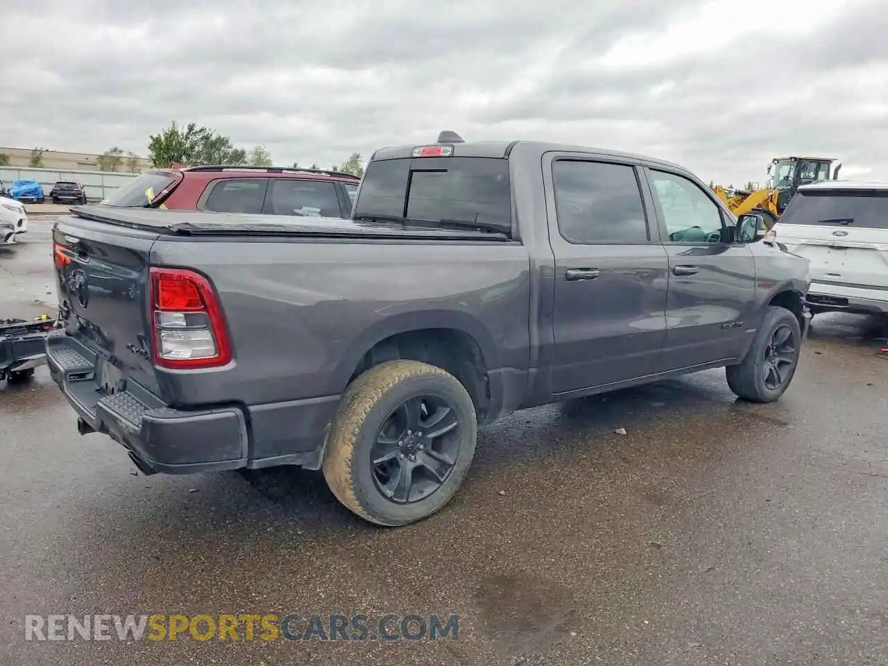 3 Photograph of a damaged car 1C6SRFFT3MN717043 RAM 1500 2021
