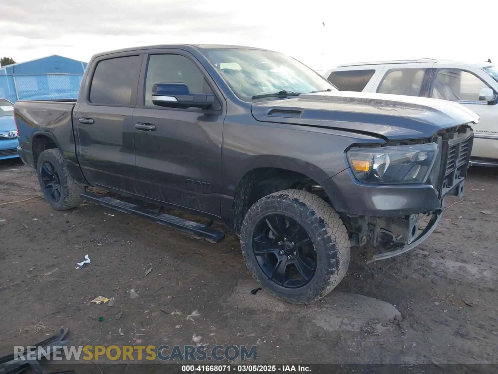 1 Photograph of a damaged car 1C6SRFFT4MN738709 RAM 1500 2021
