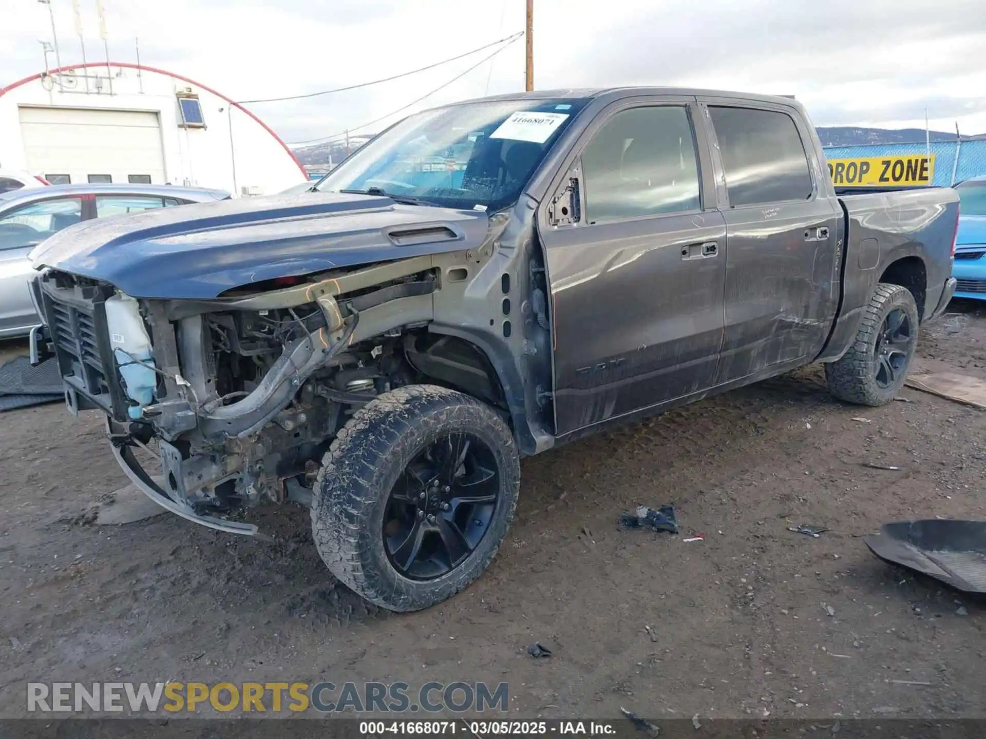 2 Photograph of a damaged car 1C6SRFFT4MN738709 RAM 1500 2021