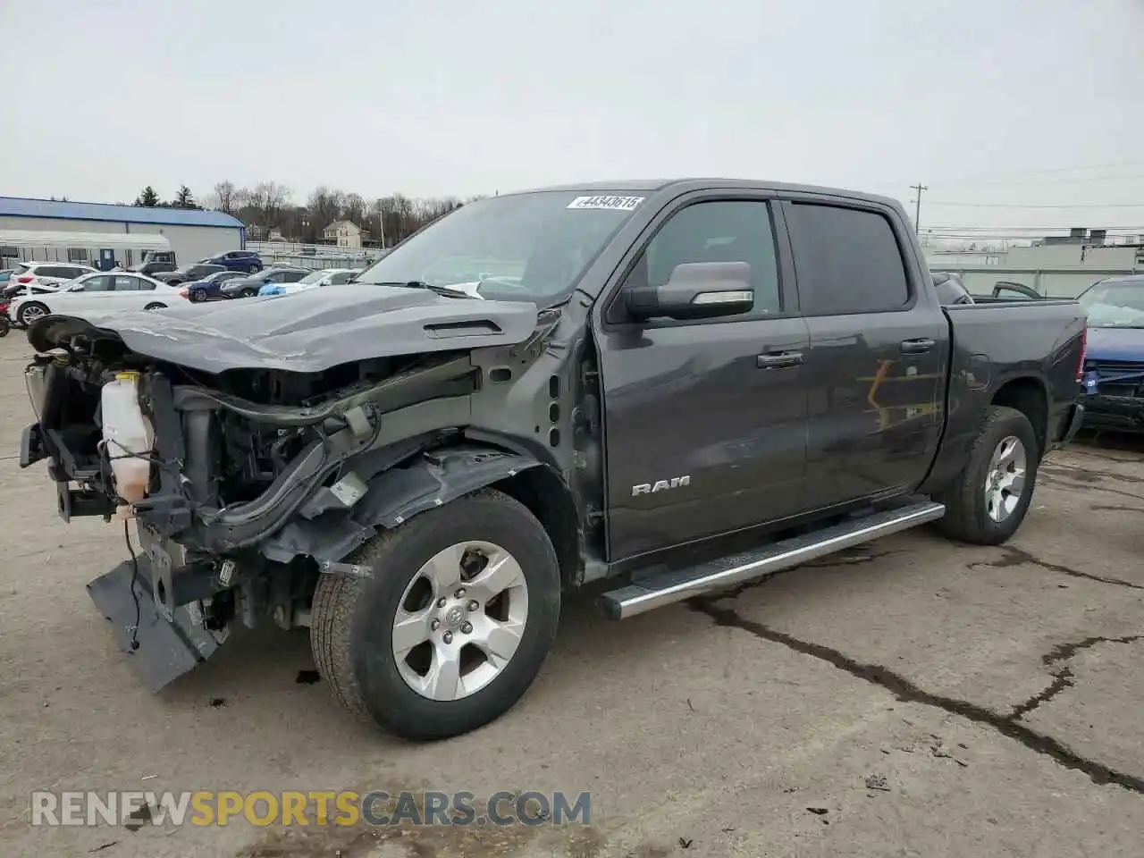 1 Photograph of a damaged car 1C6SRFFT4MN771614 RAM 1500 2021