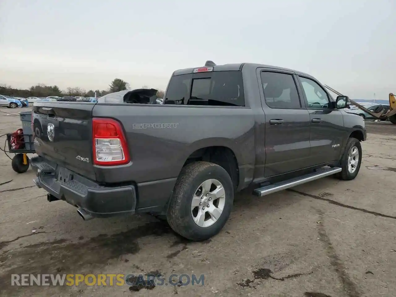 3 Photograph of a damaged car 1C6SRFFT4MN771614 RAM 1500 2021