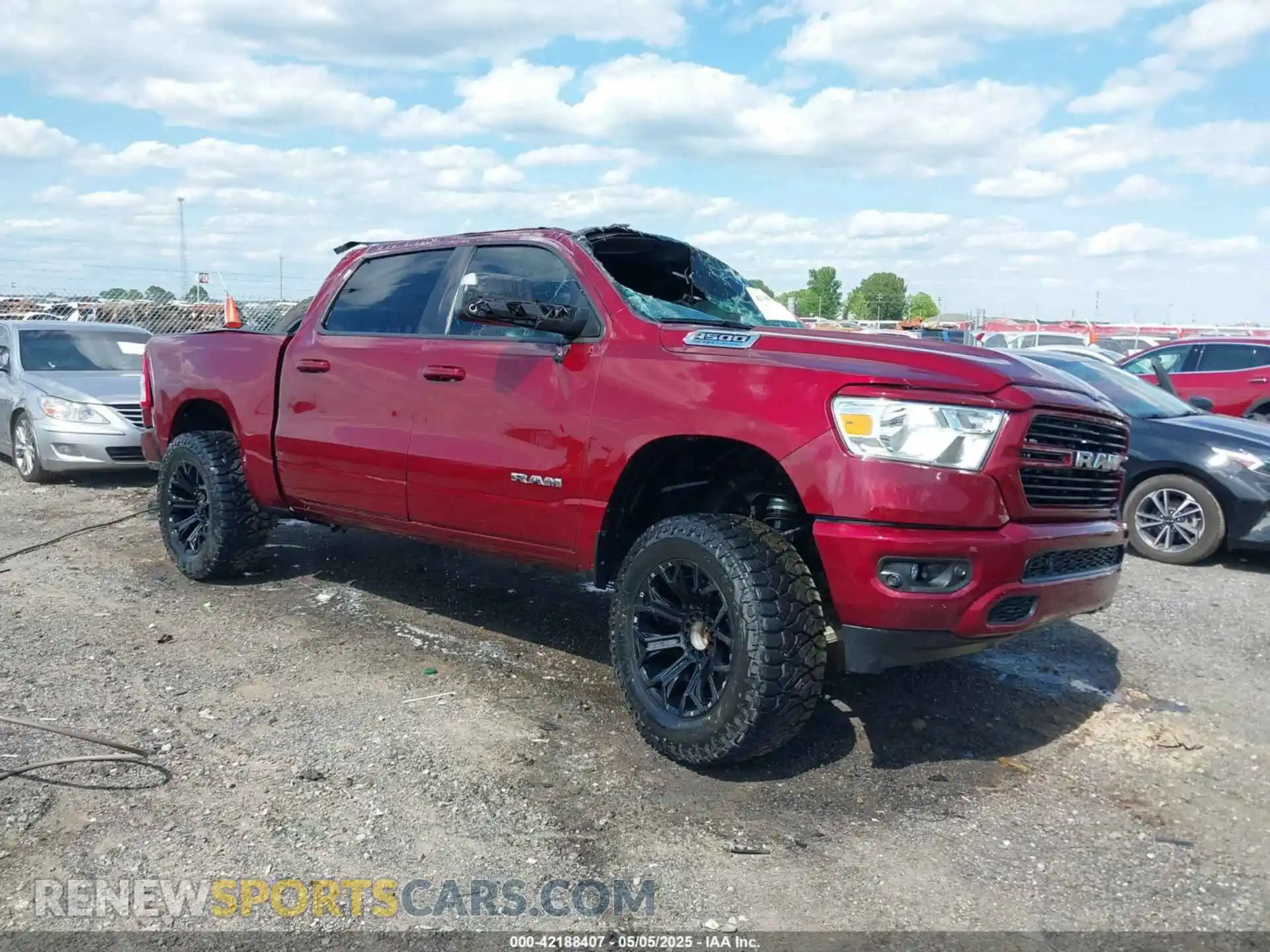 1 Photograph of a damaged car 1C6SRFFT4MN808354 RAM 1500 2021