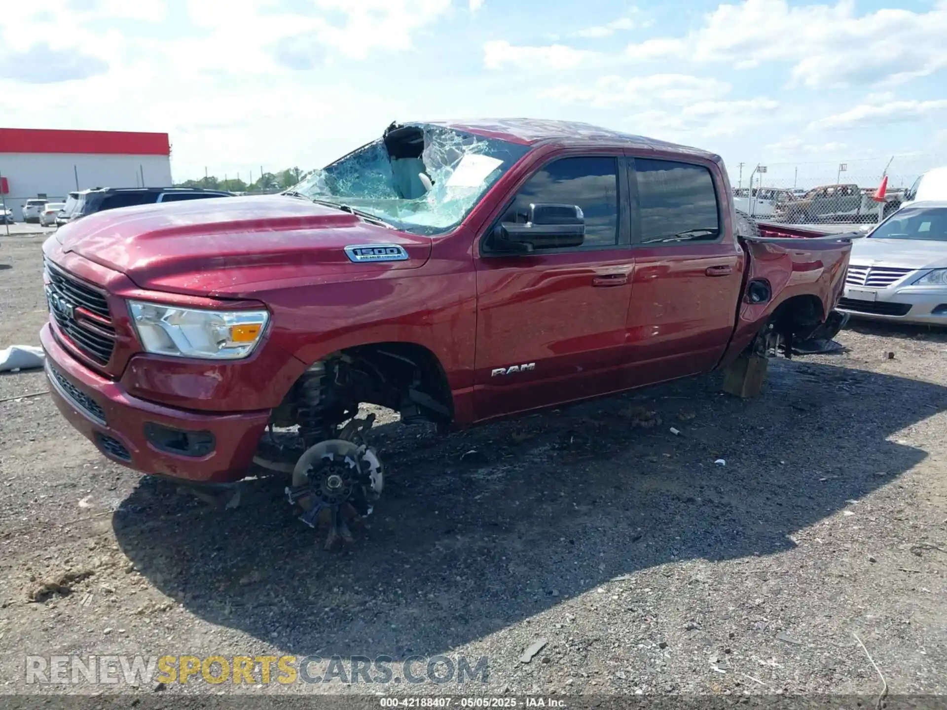 2 Photograph of a damaged car 1C6SRFFT4MN808354 RAM 1500 2021