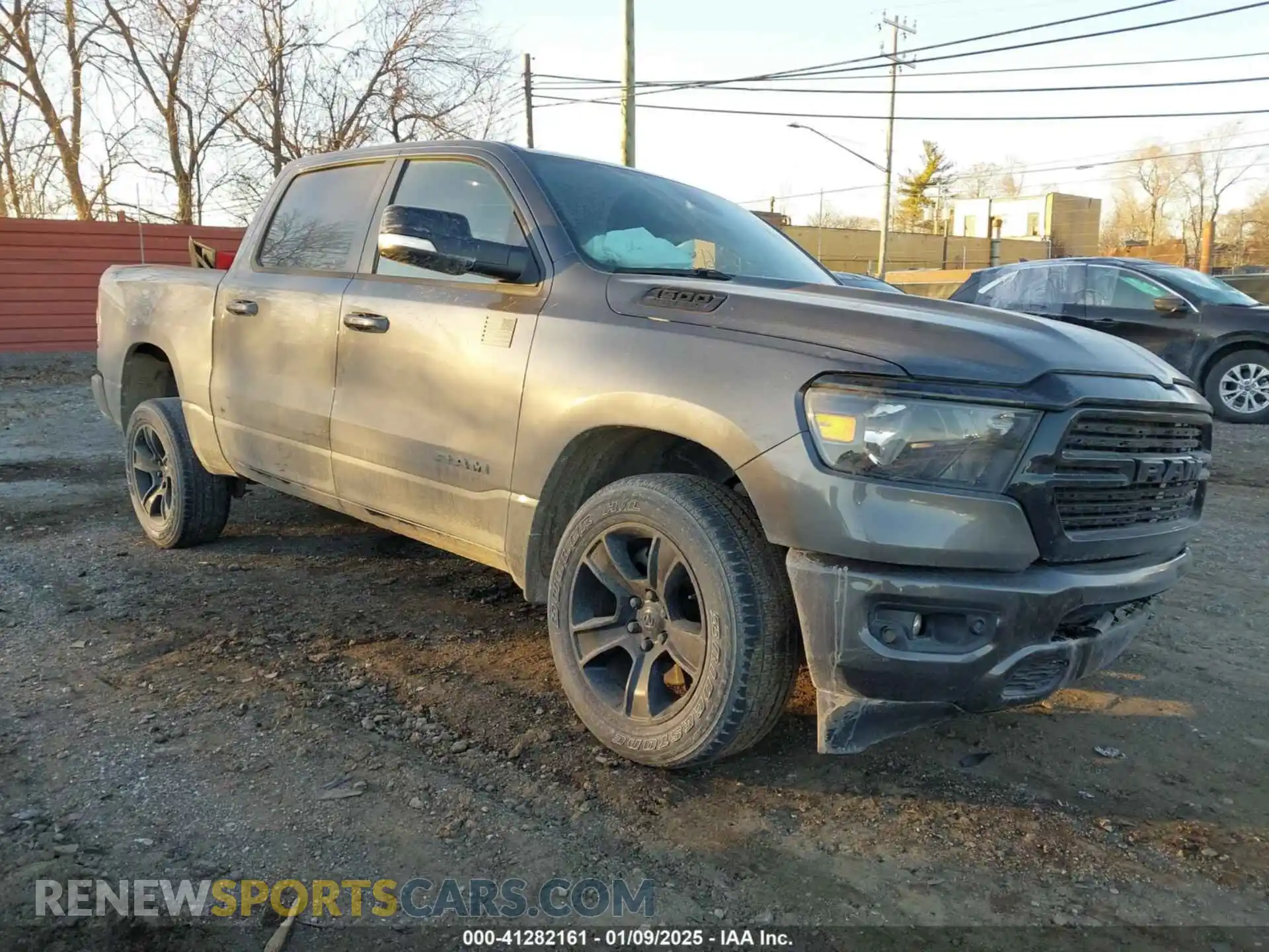 1 Photograph of a damaged car 1C6SRFFT5MN506409 RAM 1500 2021