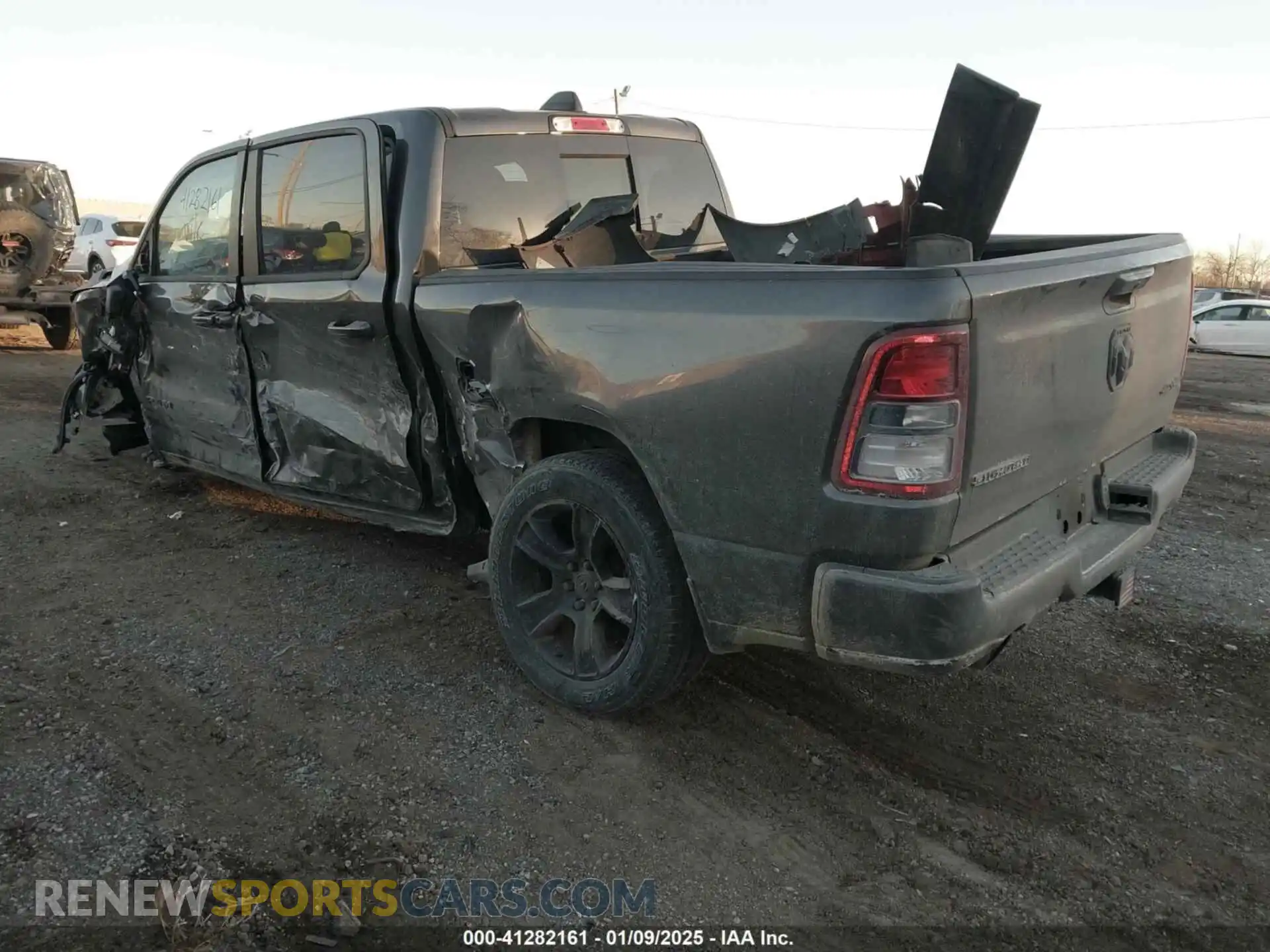 3 Photograph of a damaged car 1C6SRFFT5MN506409 RAM 1500 2021