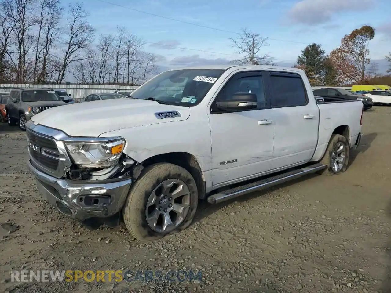 1 Photograph of a damaged car 1C6SRFFT5MN566755 RAM 1500 2021
