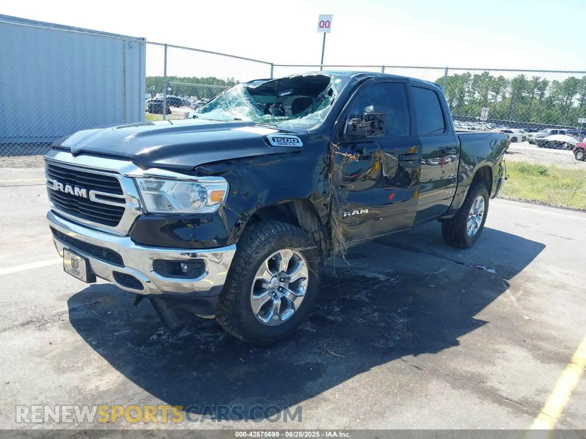 2 Photograph of a damaged car 1C6SRFFT5MN569297 RAM 1500 2021