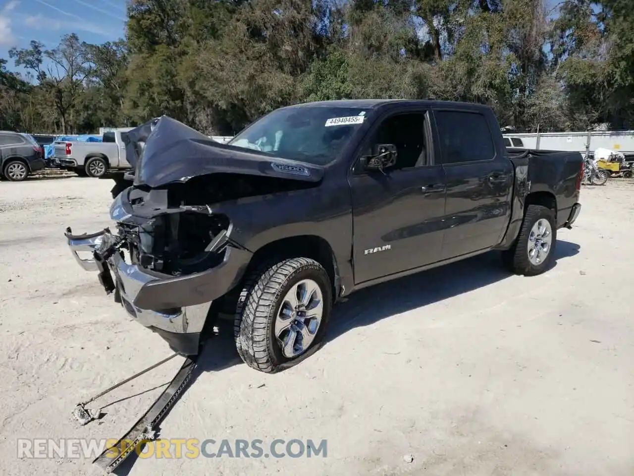 1 Photograph of a damaged car 1C6SRFFT5MN569414 RAM 1500 2021