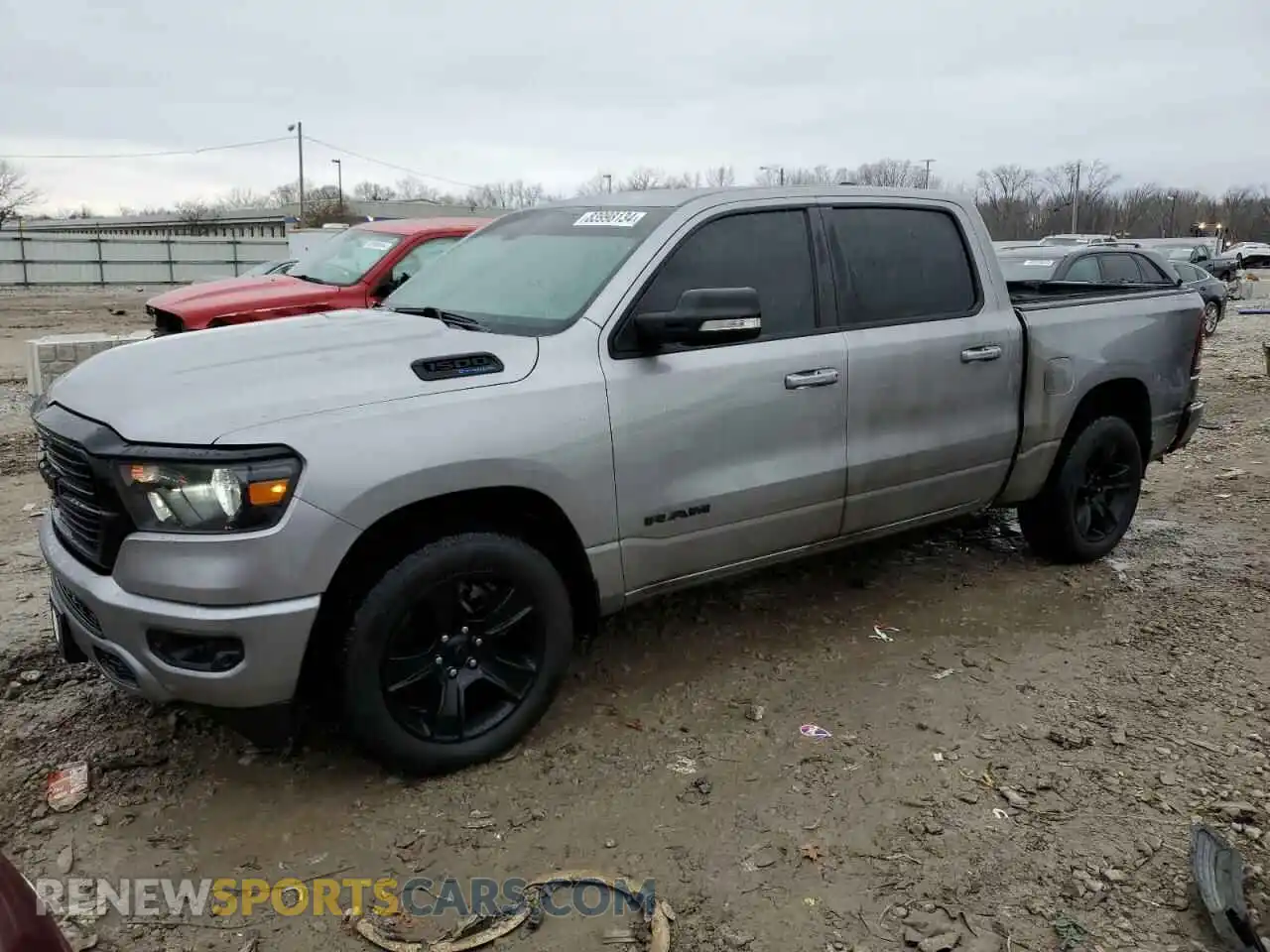 1 Photograph of a damaged car 1C6SRFFT5MN611189 RAM 1500 2021