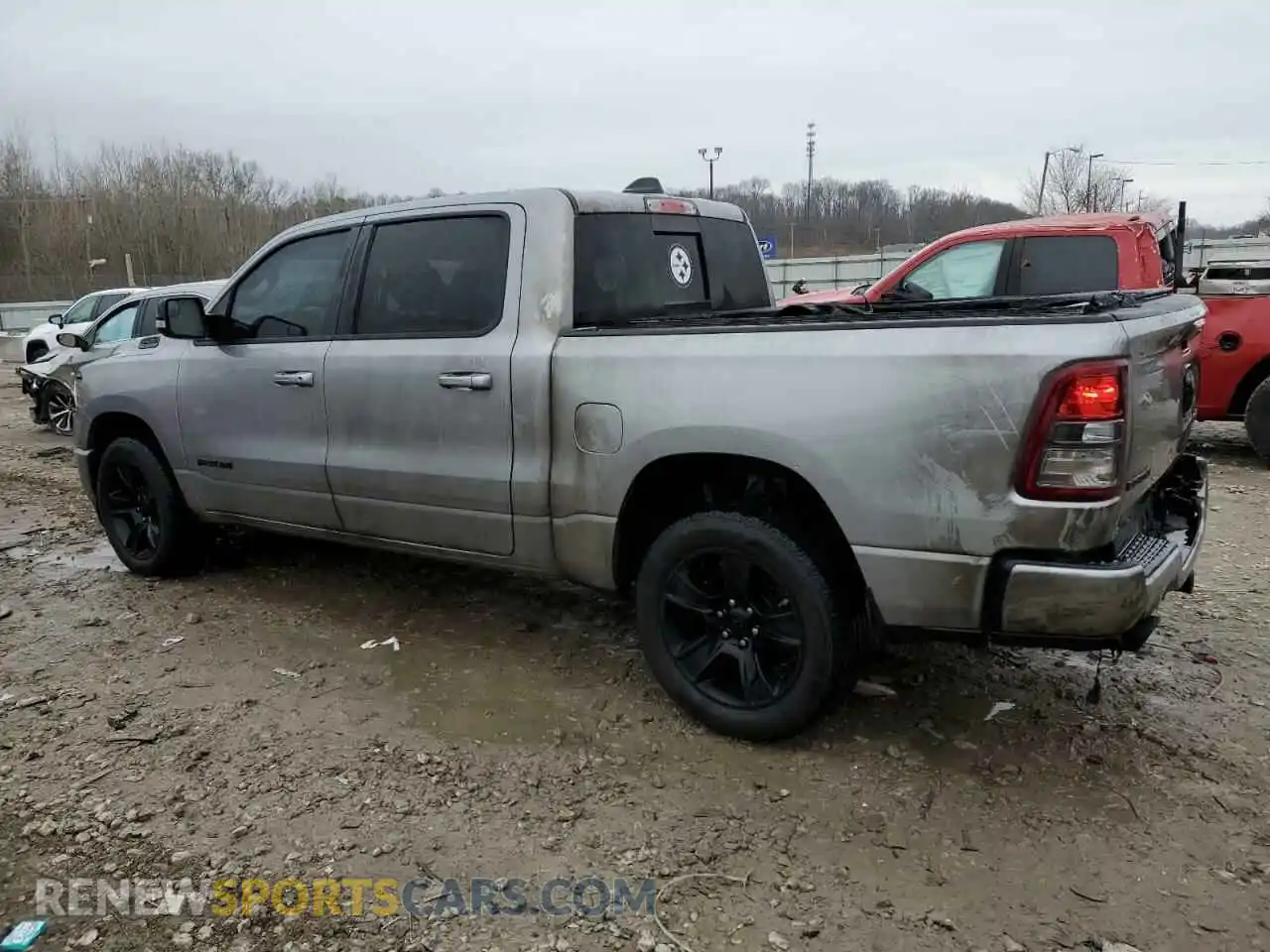 2 Photograph of a damaged car 1C6SRFFT5MN611189 RAM 1500 2021