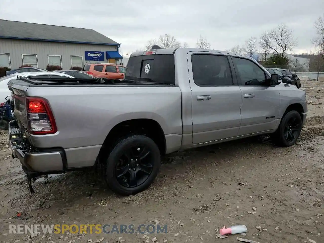3 Photograph of a damaged car 1C6SRFFT5MN611189 RAM 1500 2021