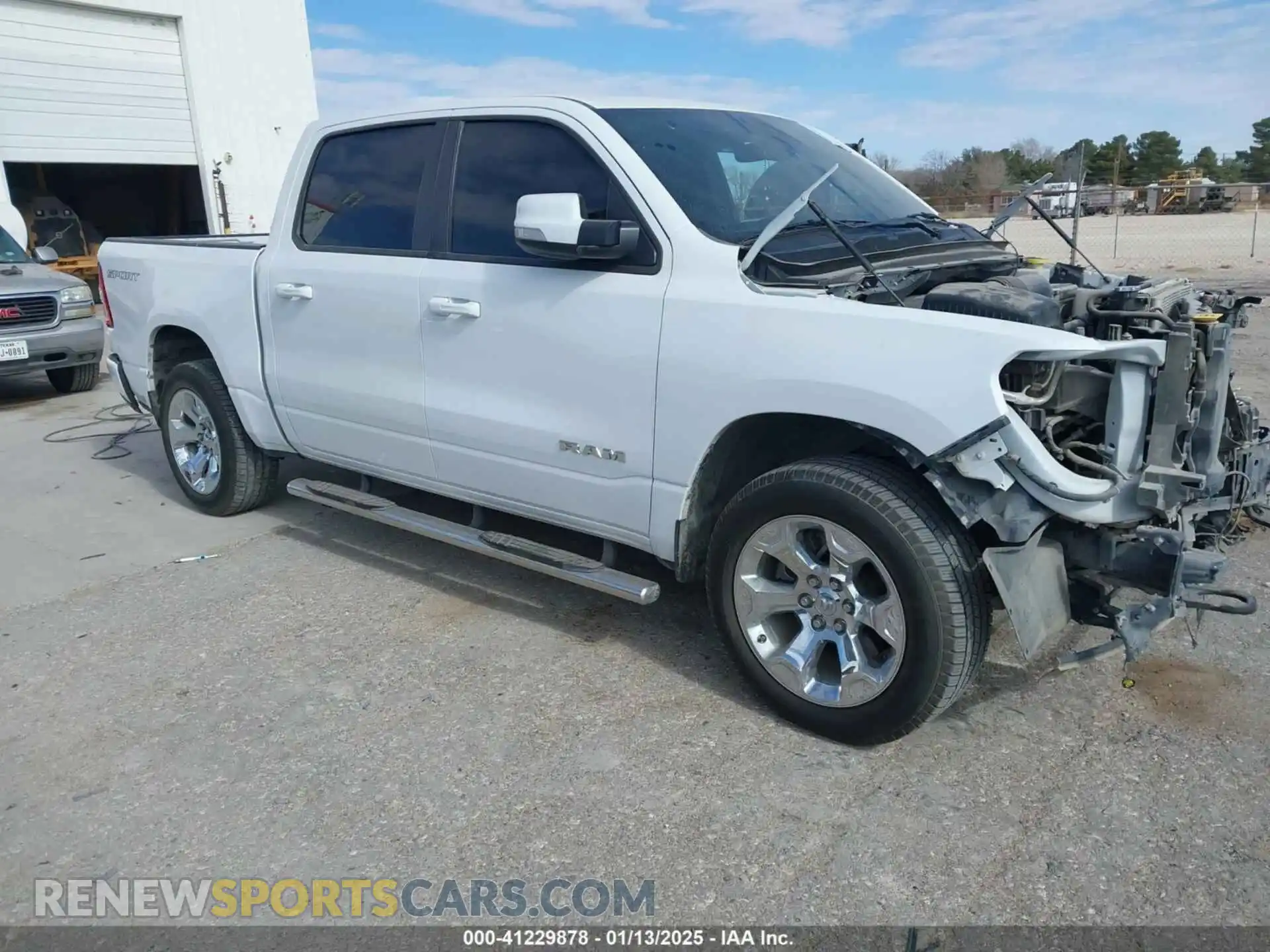 1 Photograph of a damaged car 1C6SRFFT5MN650476 RAM 1500 2021