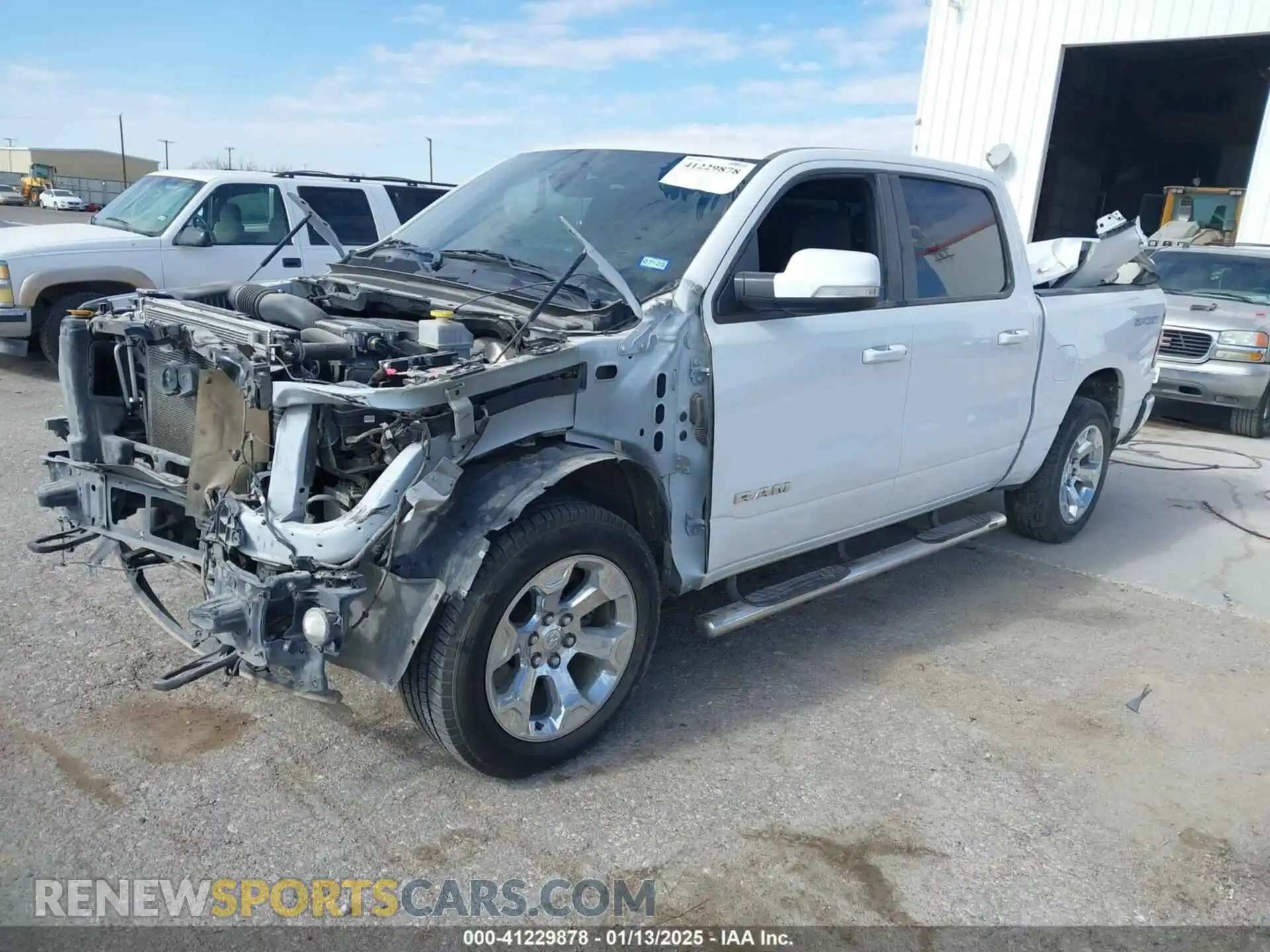 2 Photograph of a damaged car 1C6SRFFT5MN650476 RAM 1500 2021
