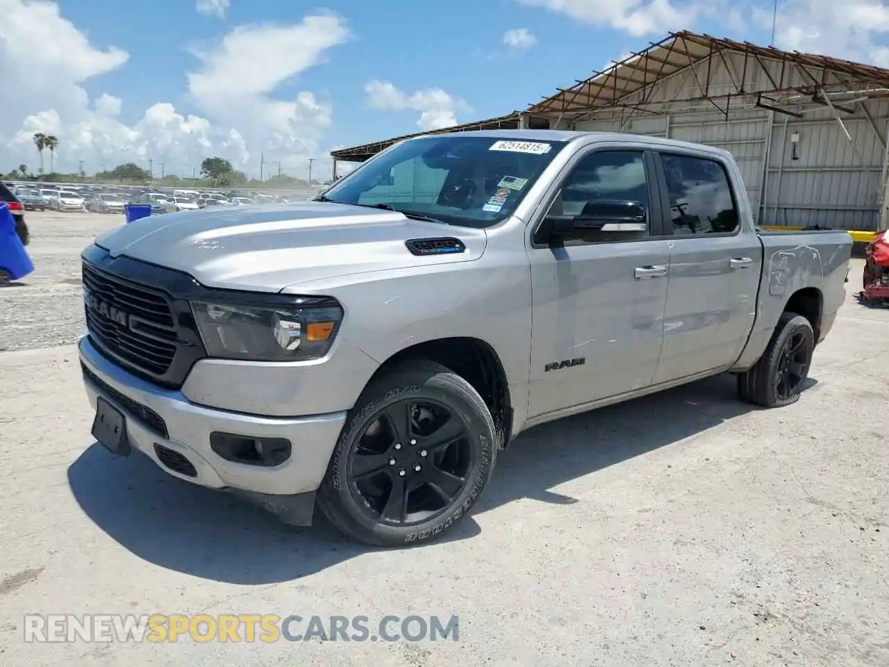 1 Photograph of a damaged car 1C6SRFFT5MN677273 RAM 1500 2021