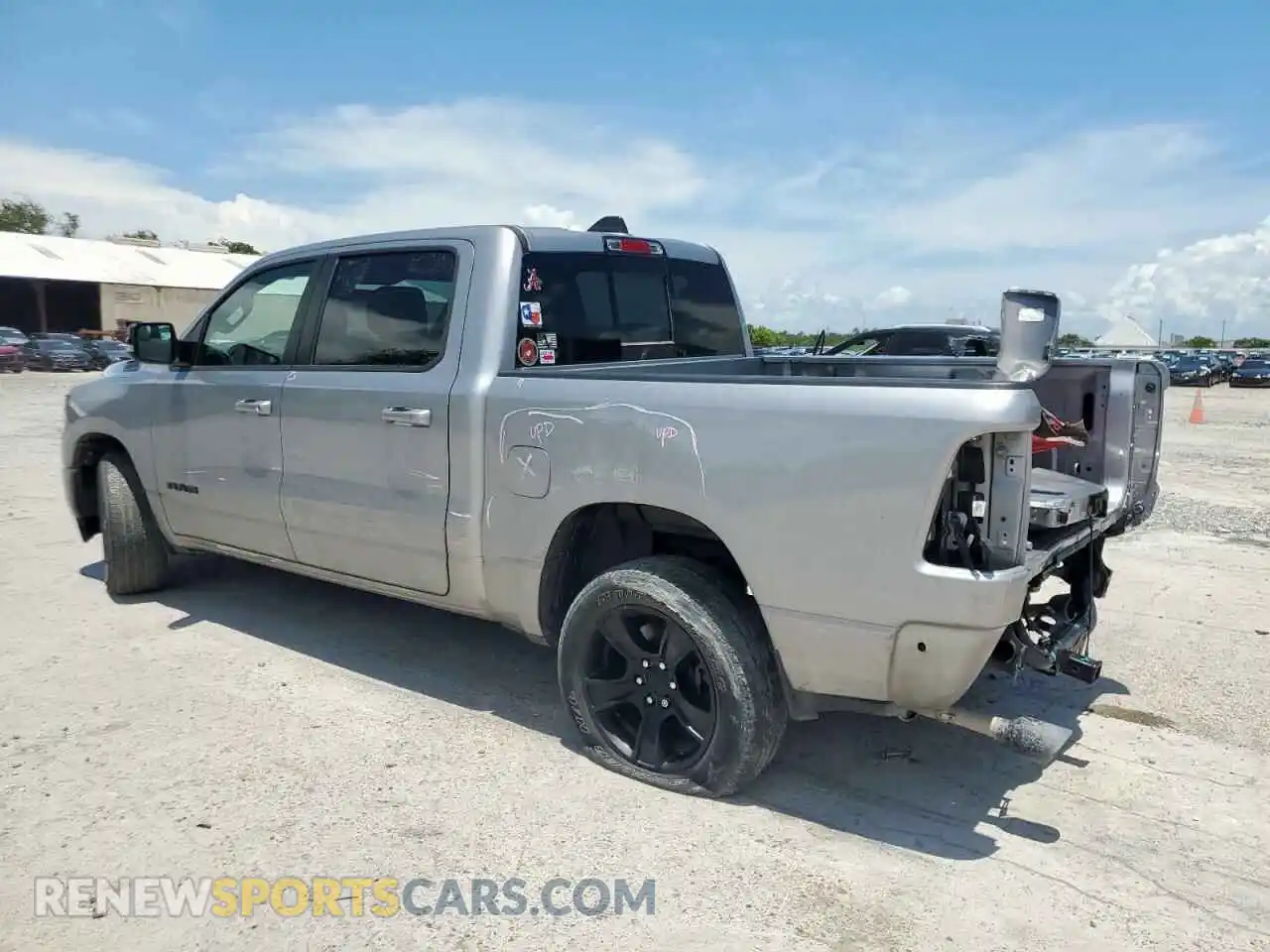 2 Photograph of a damaged car 1C6SRFFT5MN677273 RAM 1500 2021