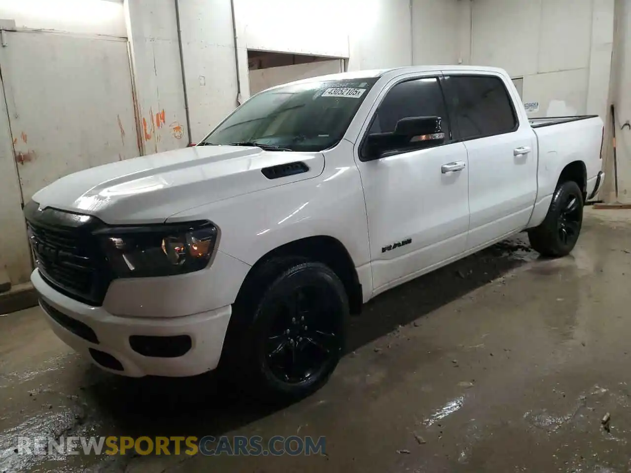 1 Photograph of a damaged car 1C6SRFFT5MN678231 RAM 1500 2021