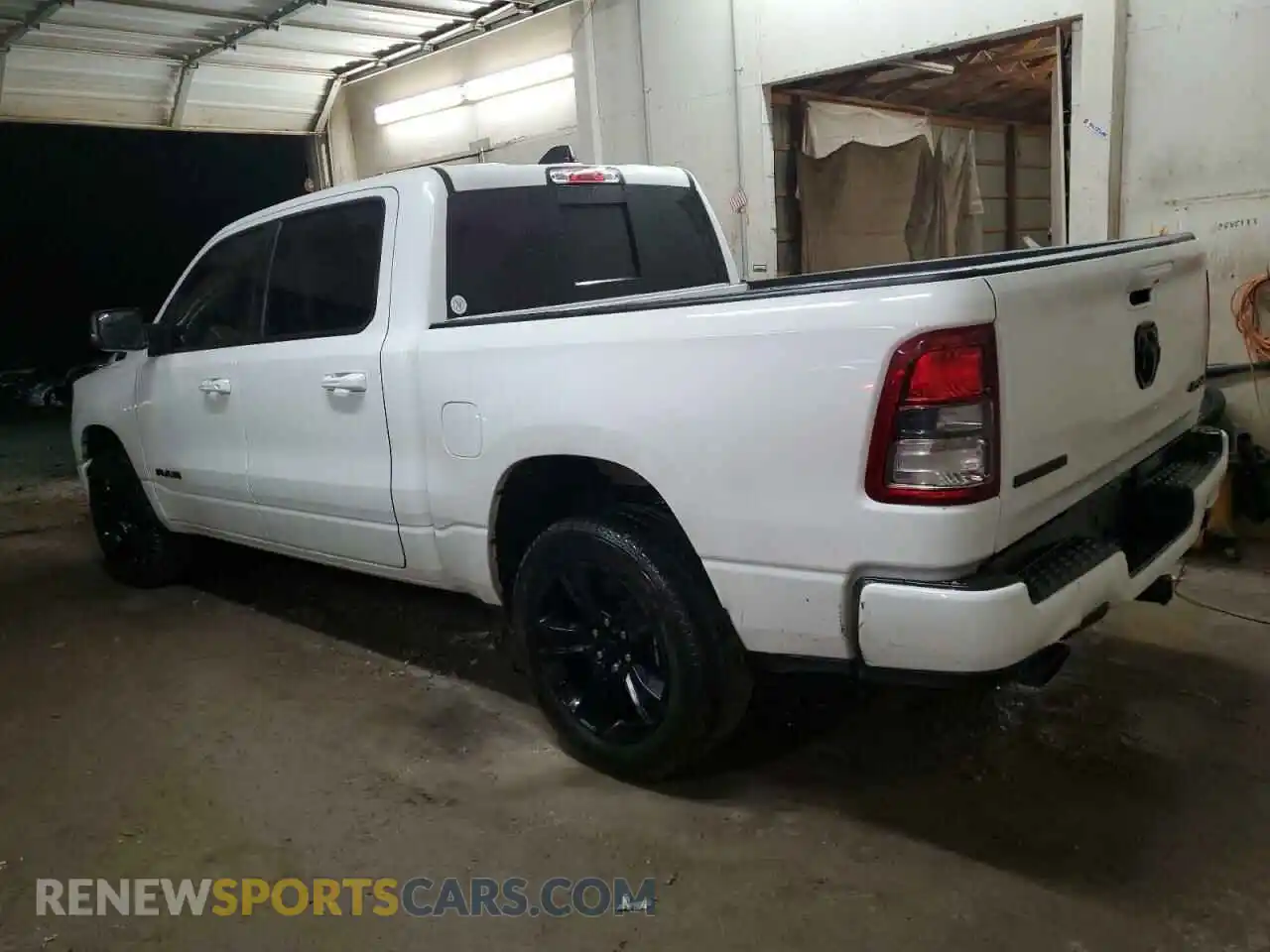 2 Photograph of a damaged car 1C6SRFFT5MN678231 RAM 1500 2021