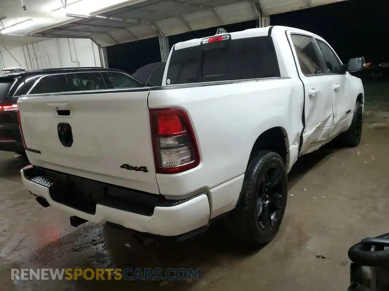 3 Photograph of a damaged car 1C6SRFFT5MN678231 RAM 1500 2021