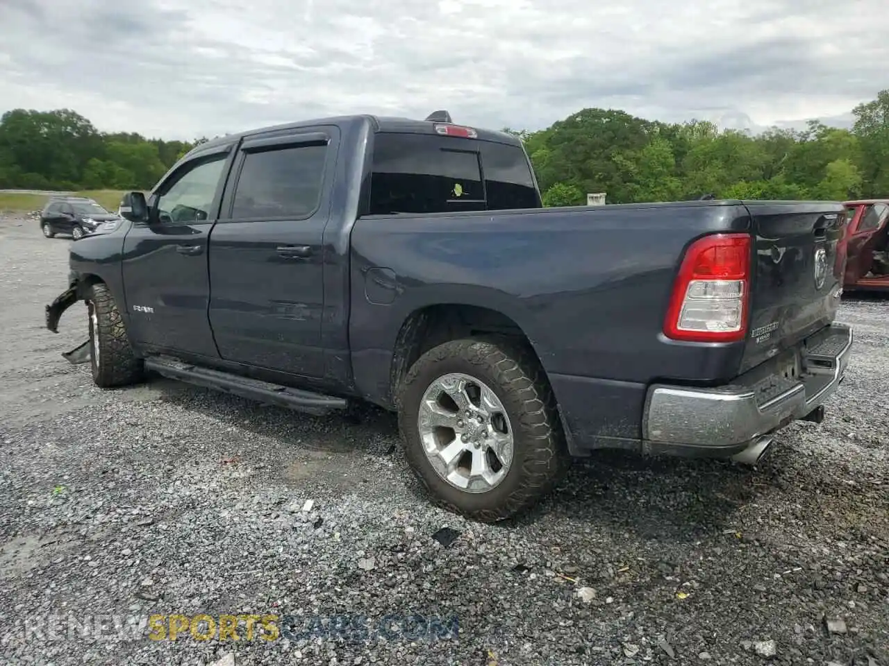 2 Photograph of a damaged car 1C6SRFFT5MN695160 RAM 1500 2021