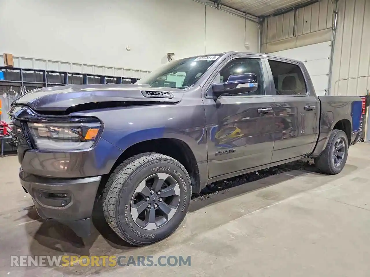 1 Photograph of a damaged car 1C6SRFFT5MN695529 RAM 1500 2021
