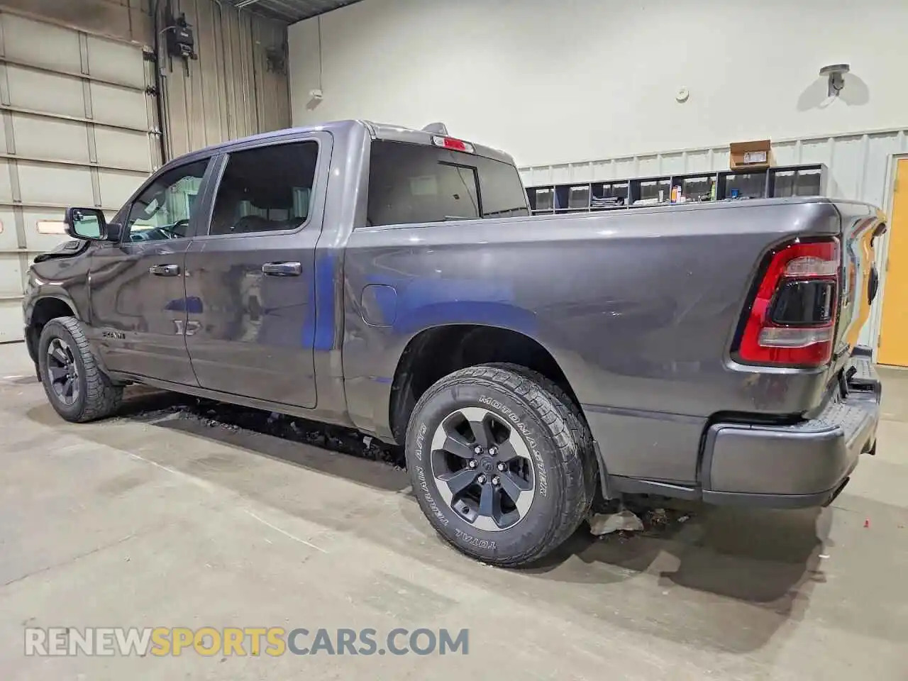 2 Photograph of a damaged car 1C6SRFFT5MN695529 RAM 1500 2021