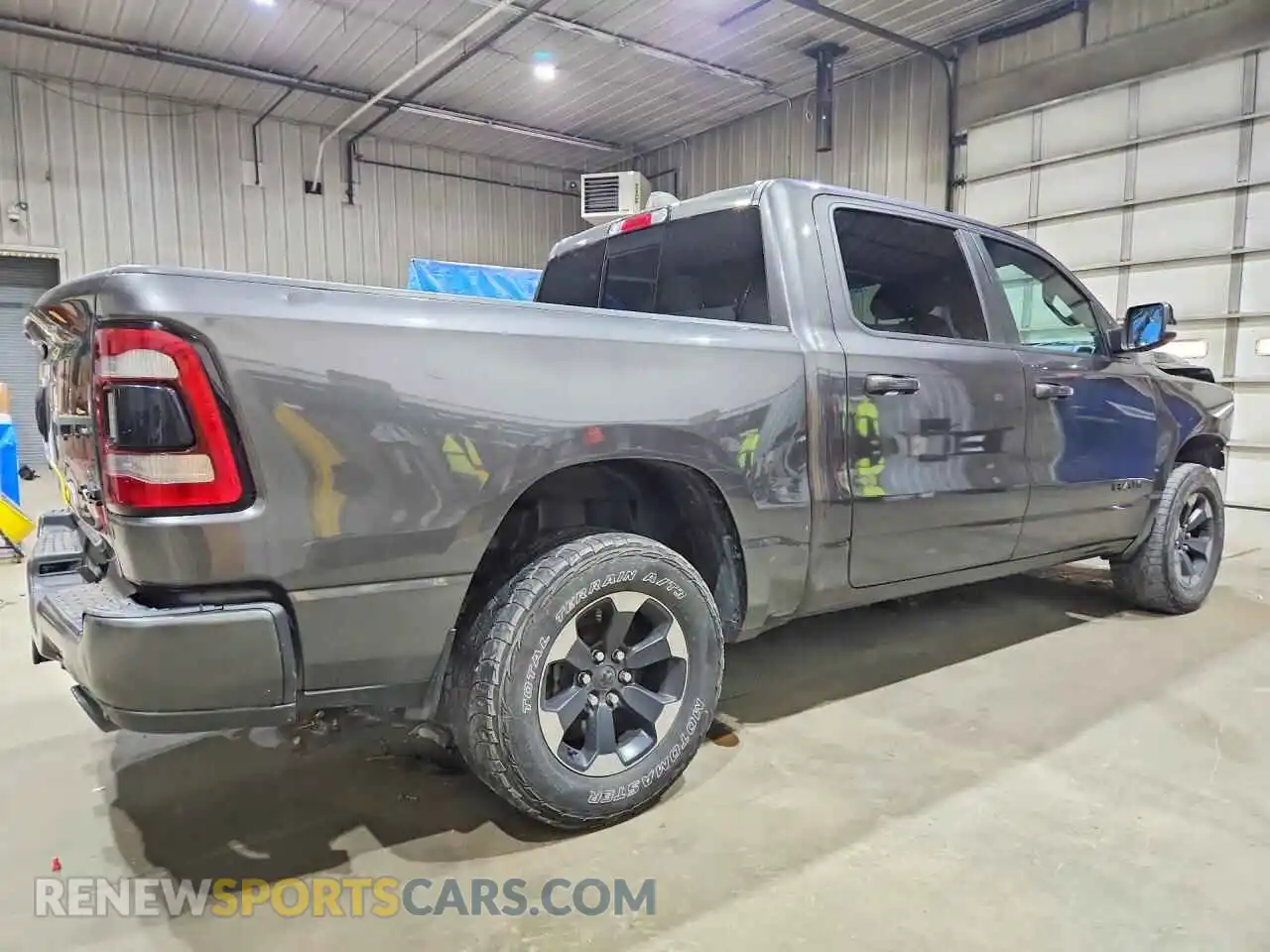 3 Photograph of a damaged car 1C6SRFFT5MN695529 RAM 1500 2021