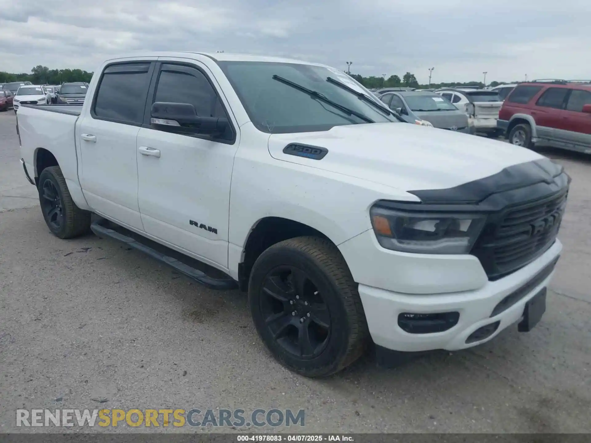 1 Photograph of a damaged car 1C6SRFFT5MN733681 RAM 1500 2021