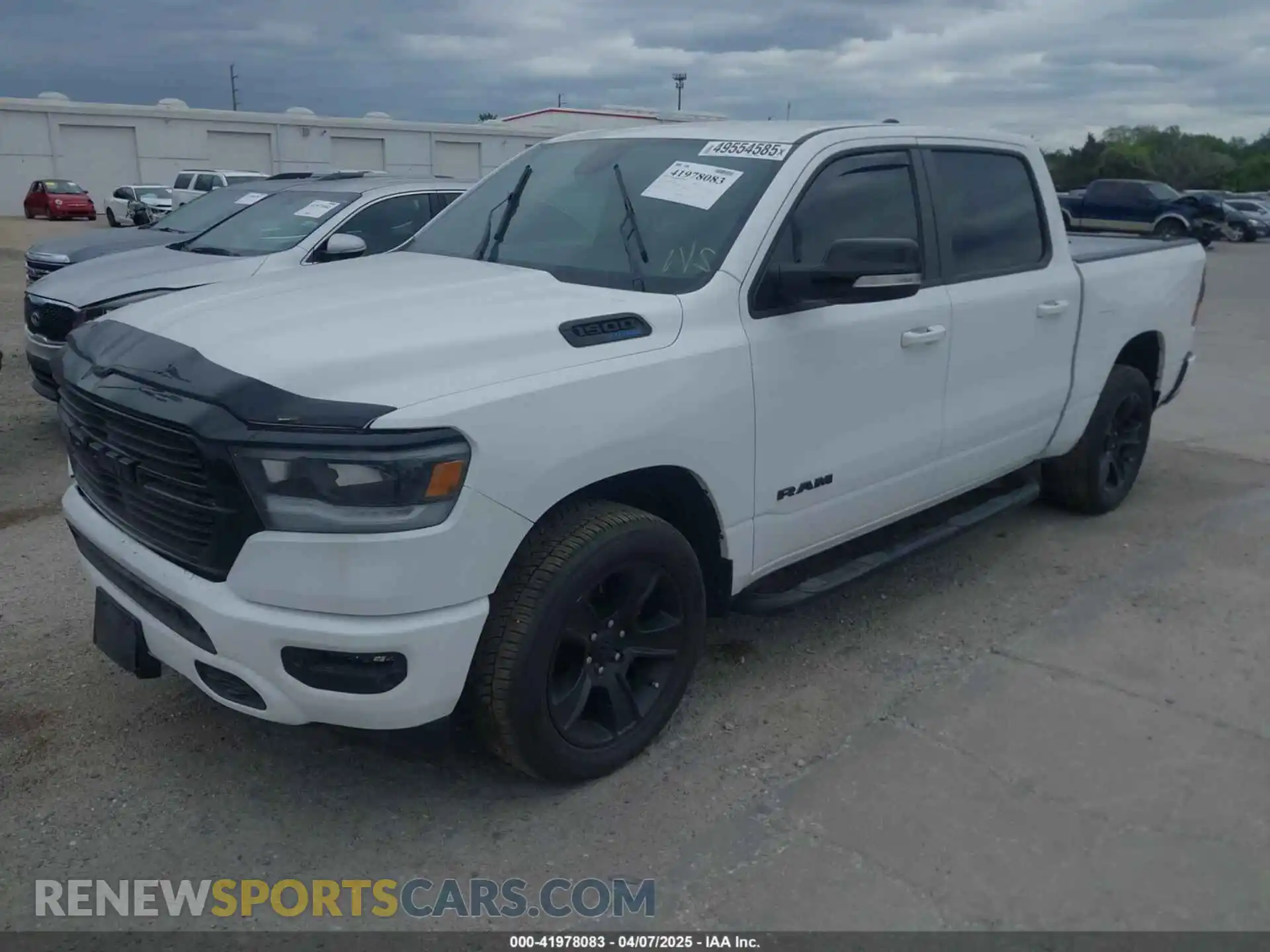 2 Photograph of a damaged car 1C6SRFFT5MN733681 RAM 1500 2021