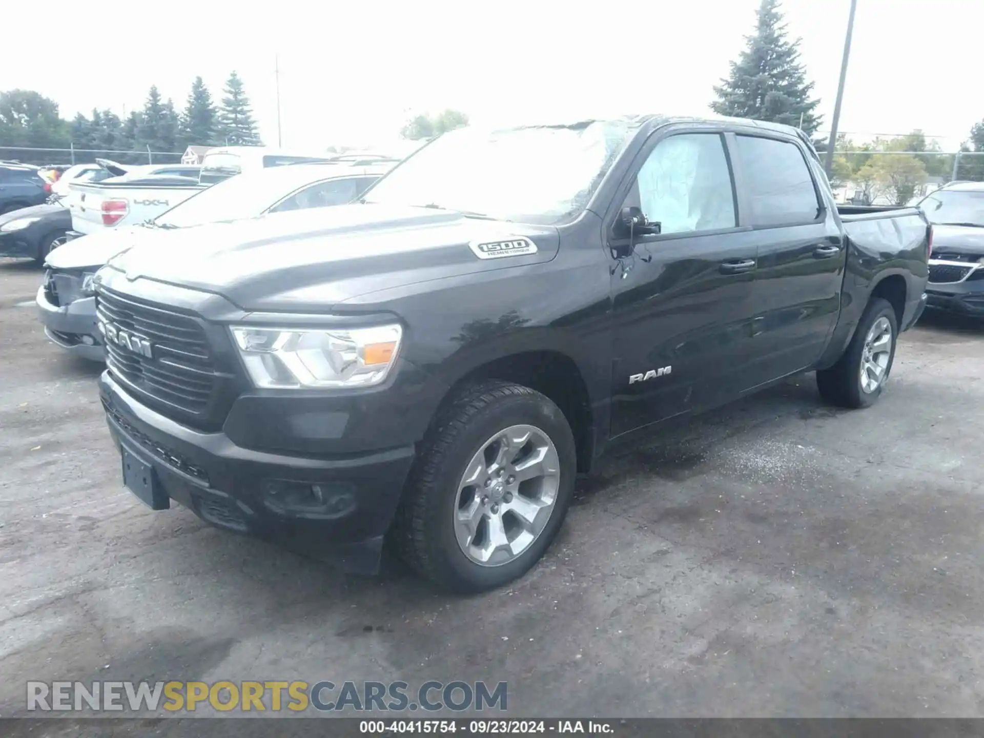2 Photograph of a damaged car 1C6SRFFT5MN778054 RAM 1500 2021